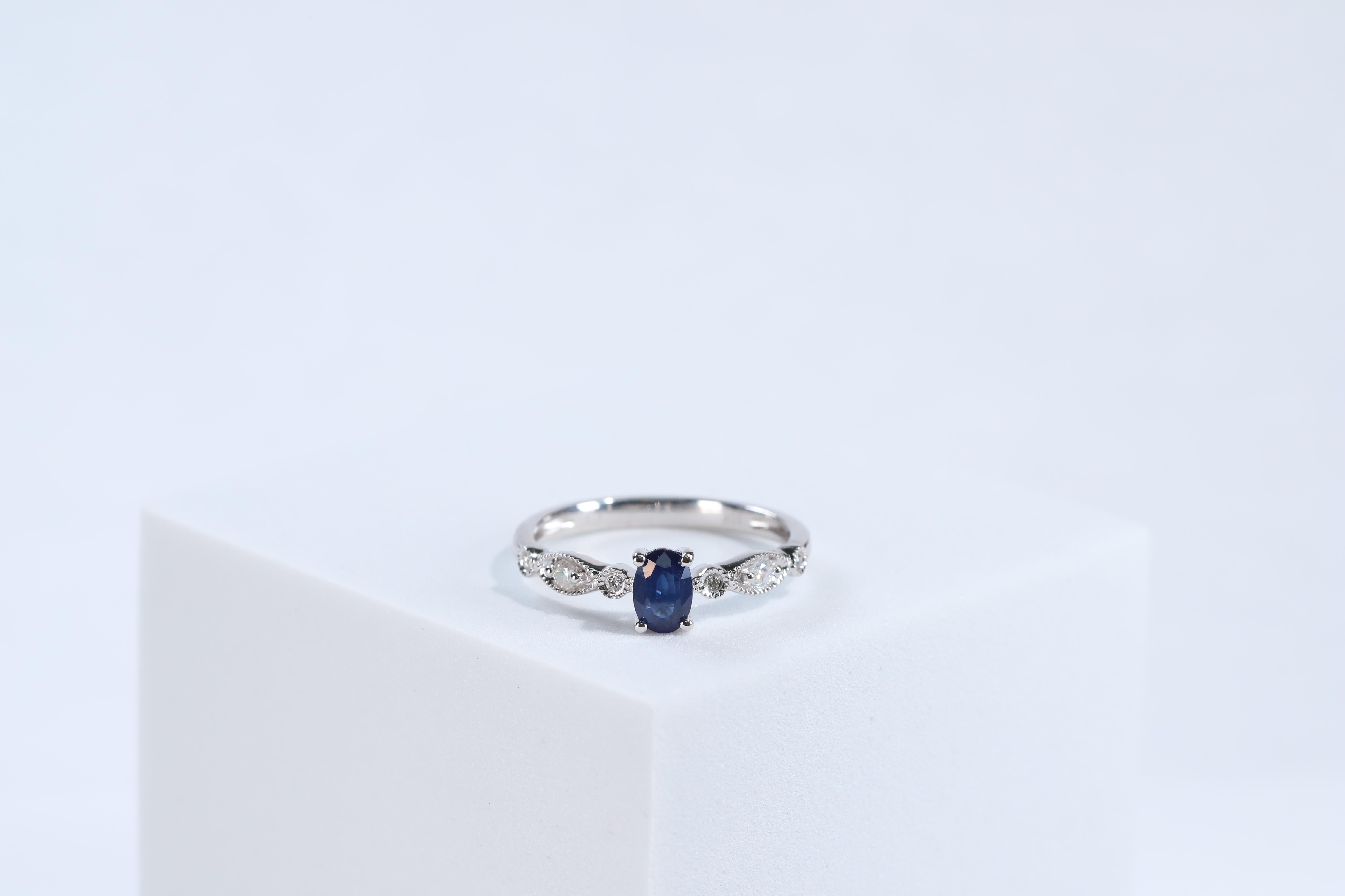 10k white gold oval sapphire and diamond ring