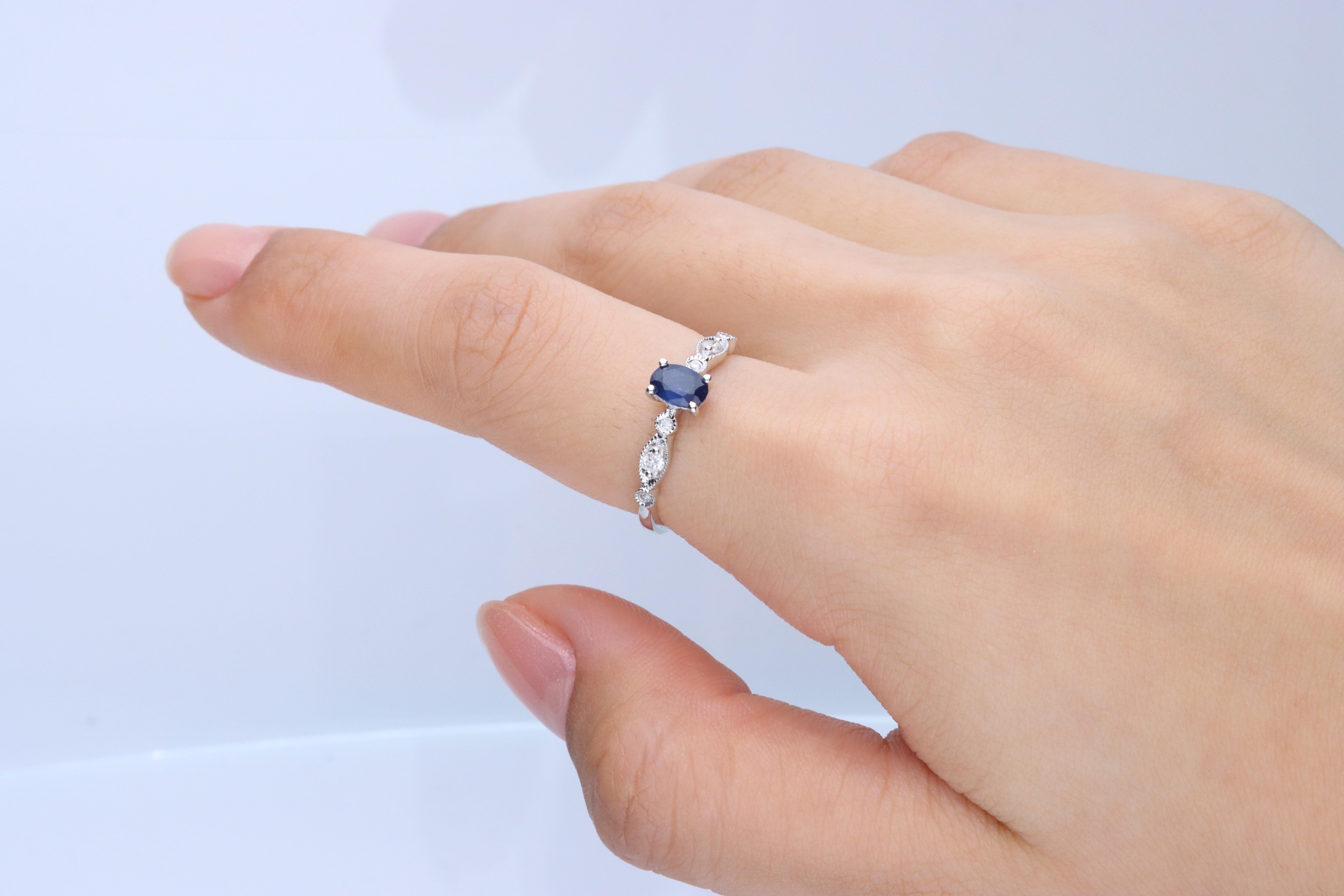 Stunning, timeless and classy eternity Unique Ring. Decorate yourself in luxury with this Gin & Grace Ring. The 10K White Gold jewelry boasts with Oval-cut 1 pcs 0.58 carat Blue sapphire and Natural Round-cut white Diamond (6 Pcs) 0.10 Carat accent