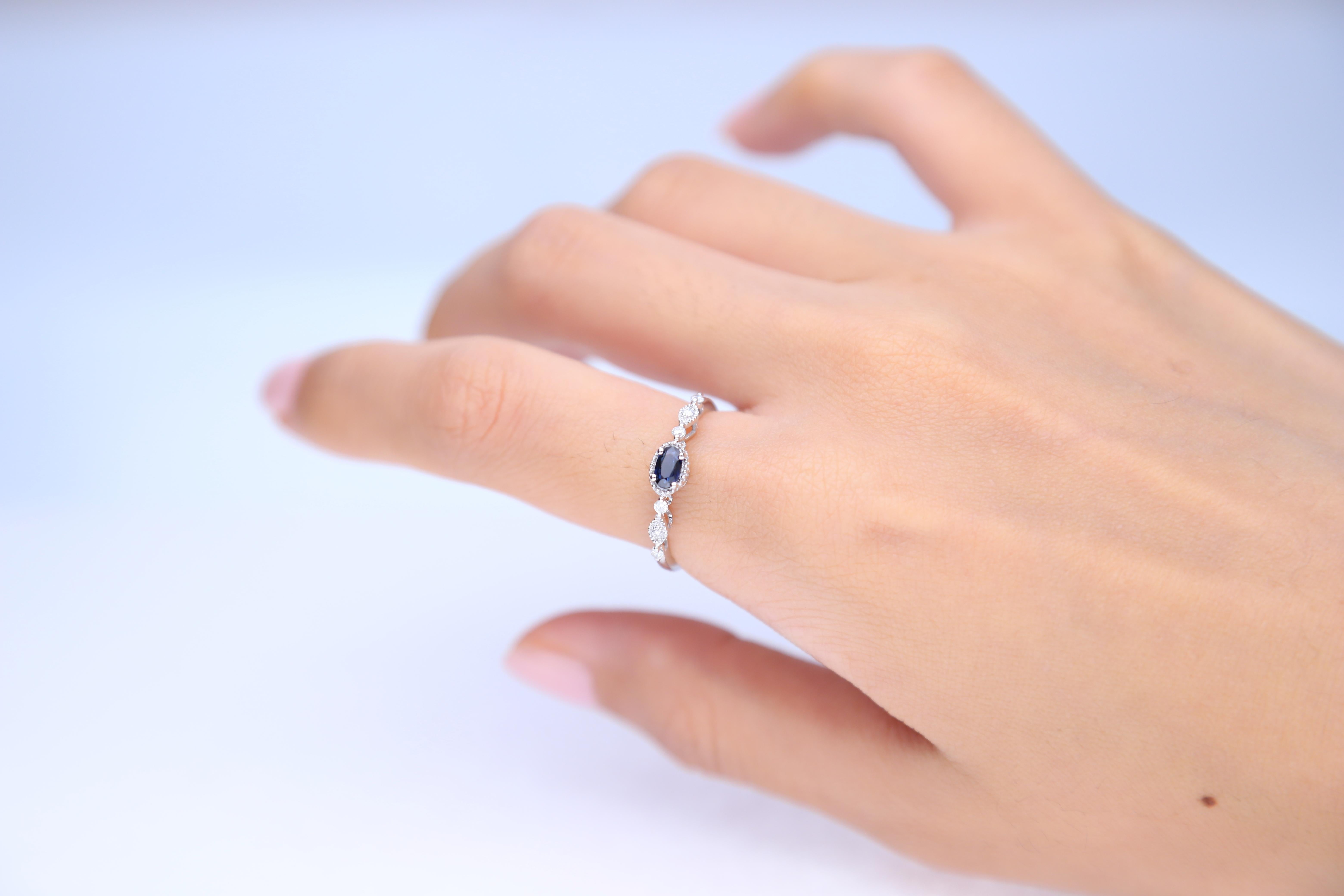 Stunning, timeless and classy eternity Unique Ring. Decorate yourself in luxury with this Gin & Grace Ring. The 10K White Gold jewelry boasts with Oval-cut 1 pcs 0.27 carat Blue Sapphire and Natural Round-cut white Diamond (6 Pcs) 0.09 Carat accent