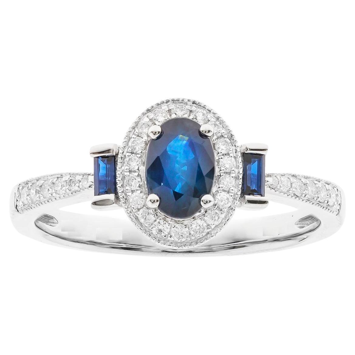 Klassischer Ring aus 10 Karat Weißgold mit blauem Saphir im Ovalschliff und Diamant im Rundschliff
