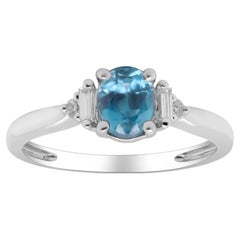 Classic Oval Cut Blue Zircon and Diamond 14K White Gold Ring