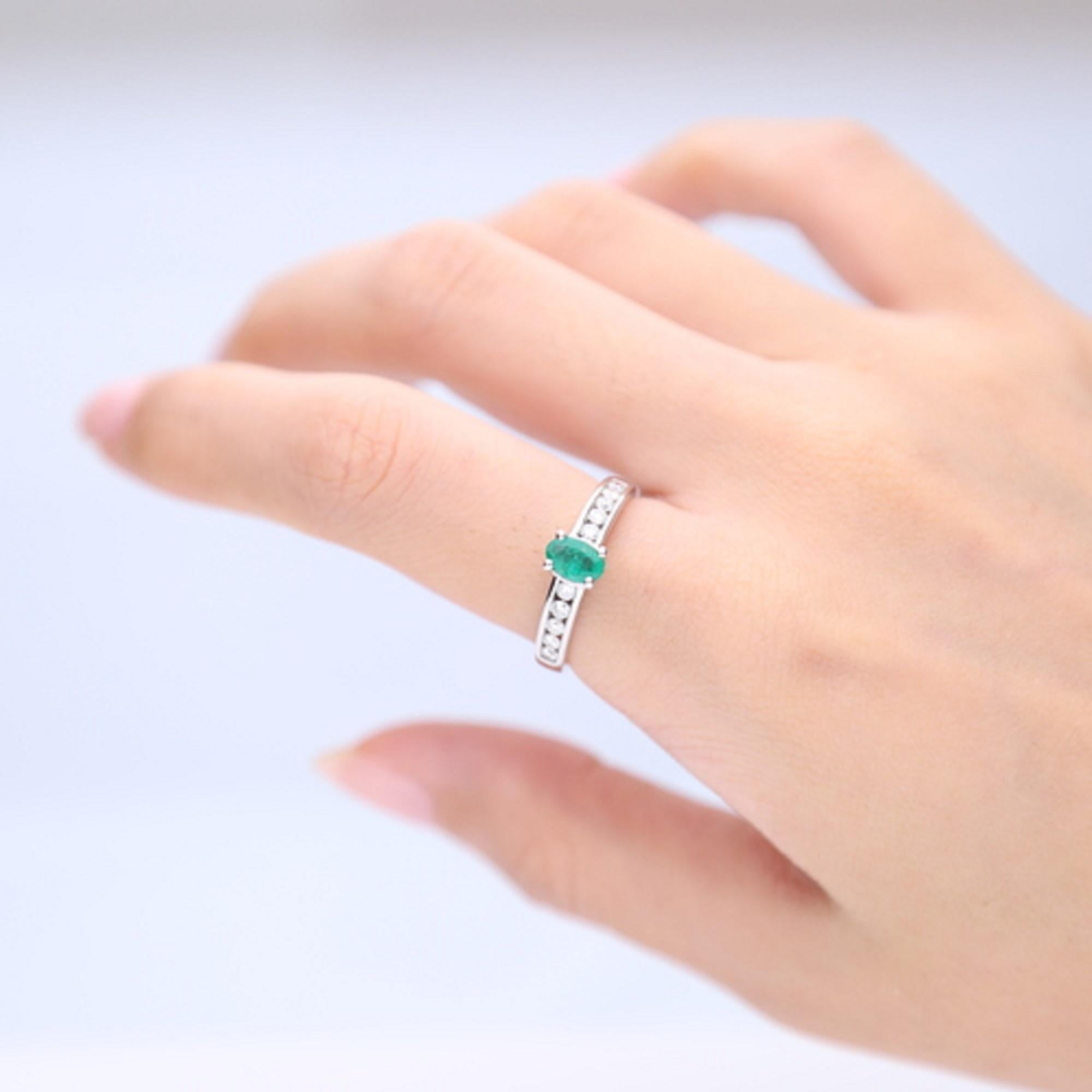 Stunning, timeless and classy eternity Unique Ring. Decorate yourself in luxury with this Gin & Grace Ring. The 14k White Gold jewelry boasts Oval cut Prong Setting Natural Emerald (1 pcs) 0.43 Carat, along with Natural Round cut white Diamond (10