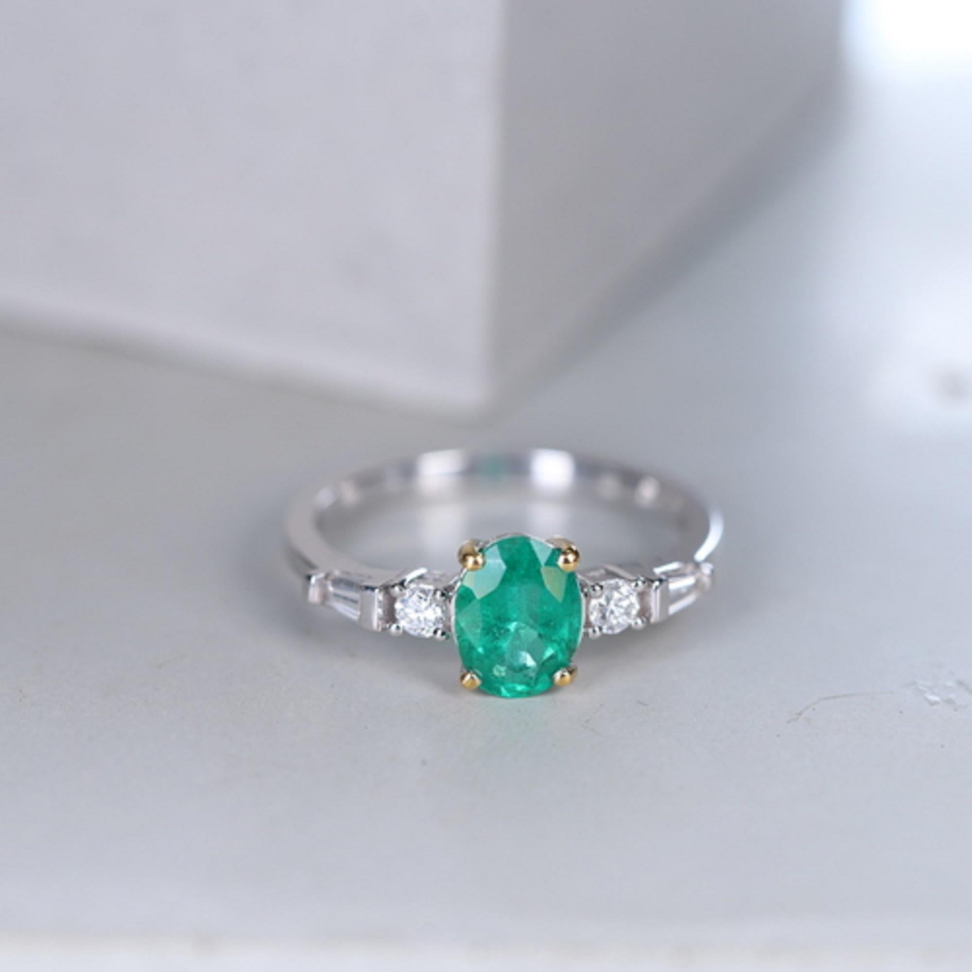 Stunning, timeless and classy eternity Unique Ring. Decorate yourself in luxury with this Gin & Grace Ring. The 18k White Gold jewelry boasts Oval cut Prong Setting Natural Zambian Emerald (1 pcs) 0.99 Carat, along with Natural Round cut white