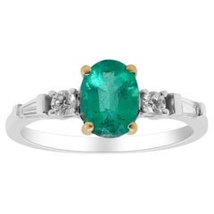 Classic Oval Cut Emerald and White Diamond 18K White Gold Ring