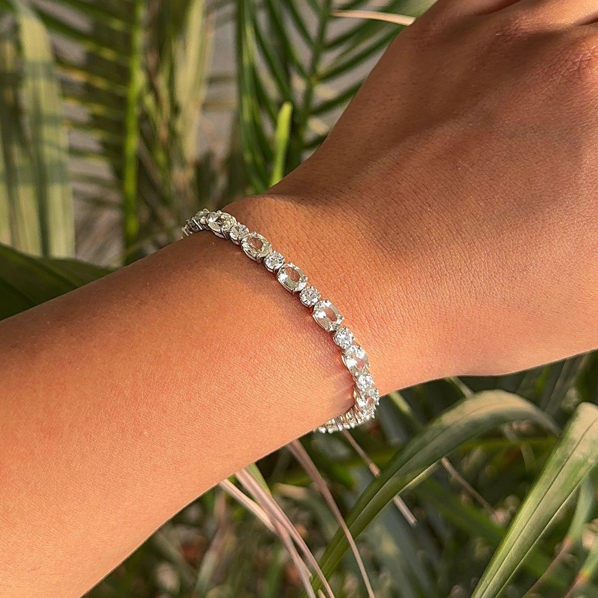 Classic Oval Cut Green Amethyst and Zircon Silver Tennis Bracelet. You shall need statement tennis bracelet to make a statement with your look. Each piece features dazzling cubic zirconia stones, renowned for their brilliance and clarity, set in