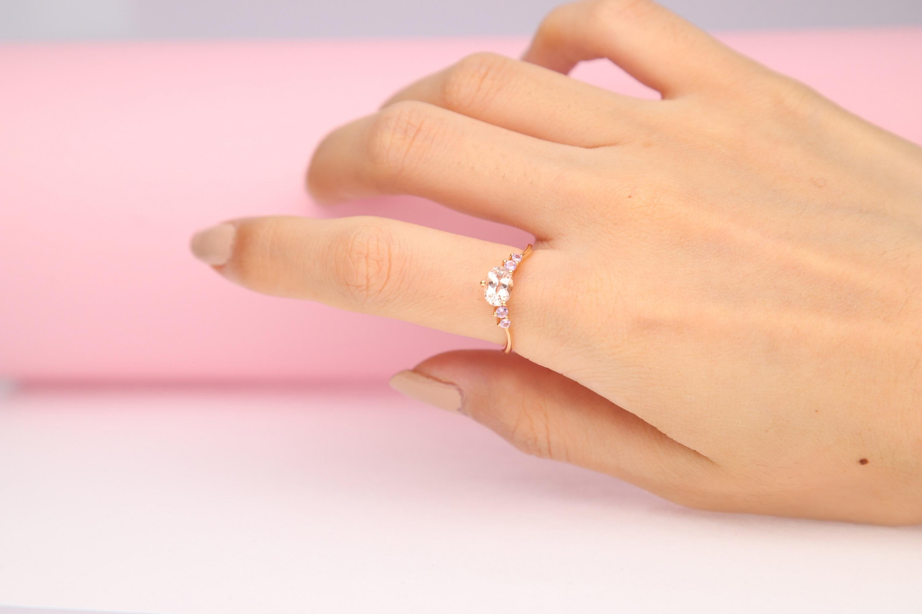 Stunning, timeless and classy eternity Unique Ring. Decorate yourself in luxury with this Gin & Grace Ring. The 14K Rose Gold jewelry boasts with Oval-cut 1 pcs 0.69 carat Morganite and Round-cut Pink Sapphire (4 Pcs) 0.15 Carat accent stones for a