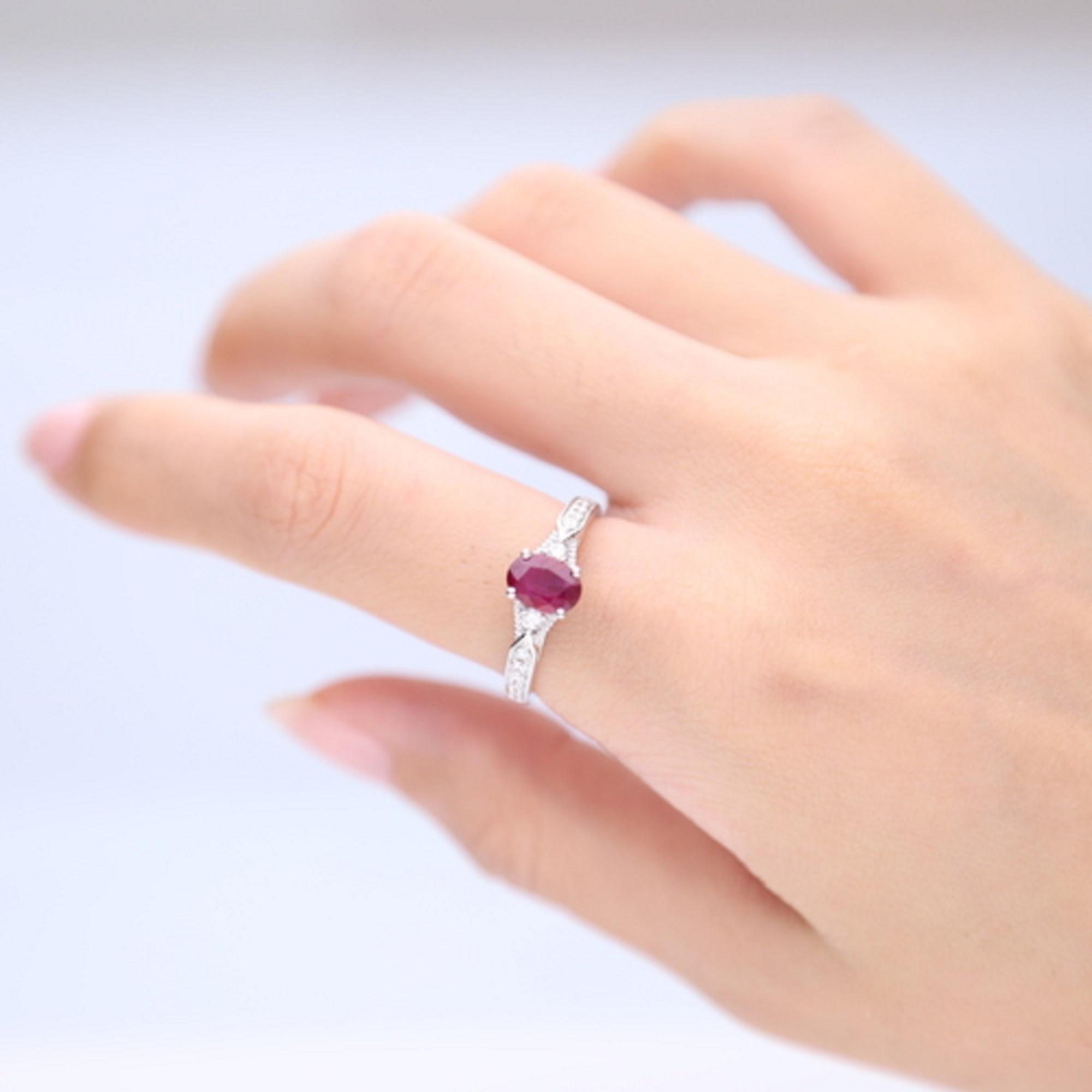Stunning, timeless and classy eternity Unique Ring. Decorate yourself in luxury with this Gin & Grace Ring. The 14k White Gold jewelry boasts Oval cut Prong Setting Natural Ruby (1 pcs) 0.90 Carat, along with Natural Round cut white Diamond (14 Pcs)