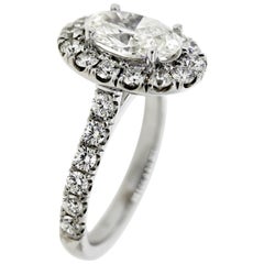 Classic Oval Diamond Halo Engagement Ring and Wedding Band 
GIA Certified
