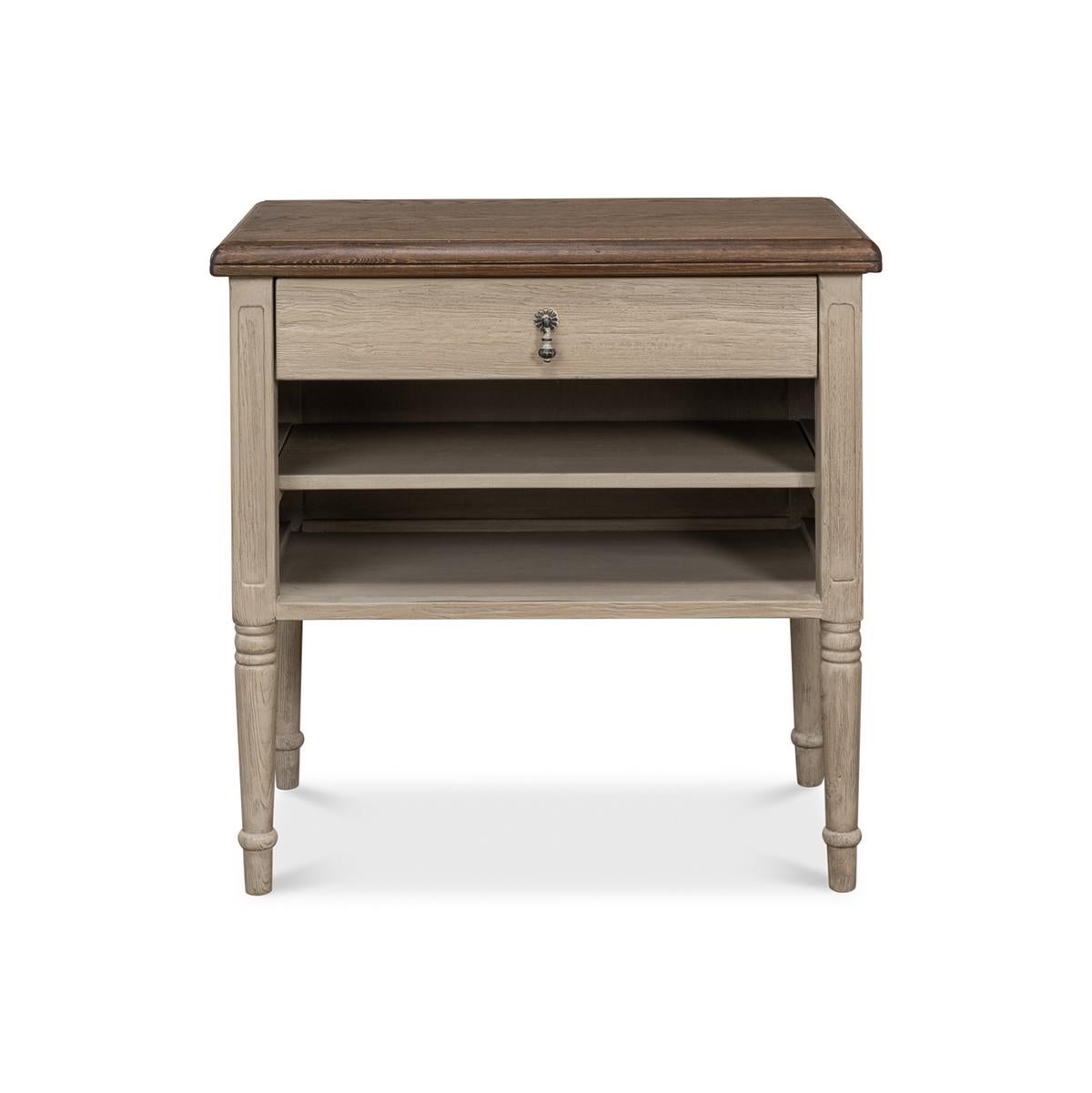 Made with pine and an oak top in a barn grey painted finish and brown transitional top. With a single drawer and open shelves raised on turned and tapered legs.

Dimensions: 30