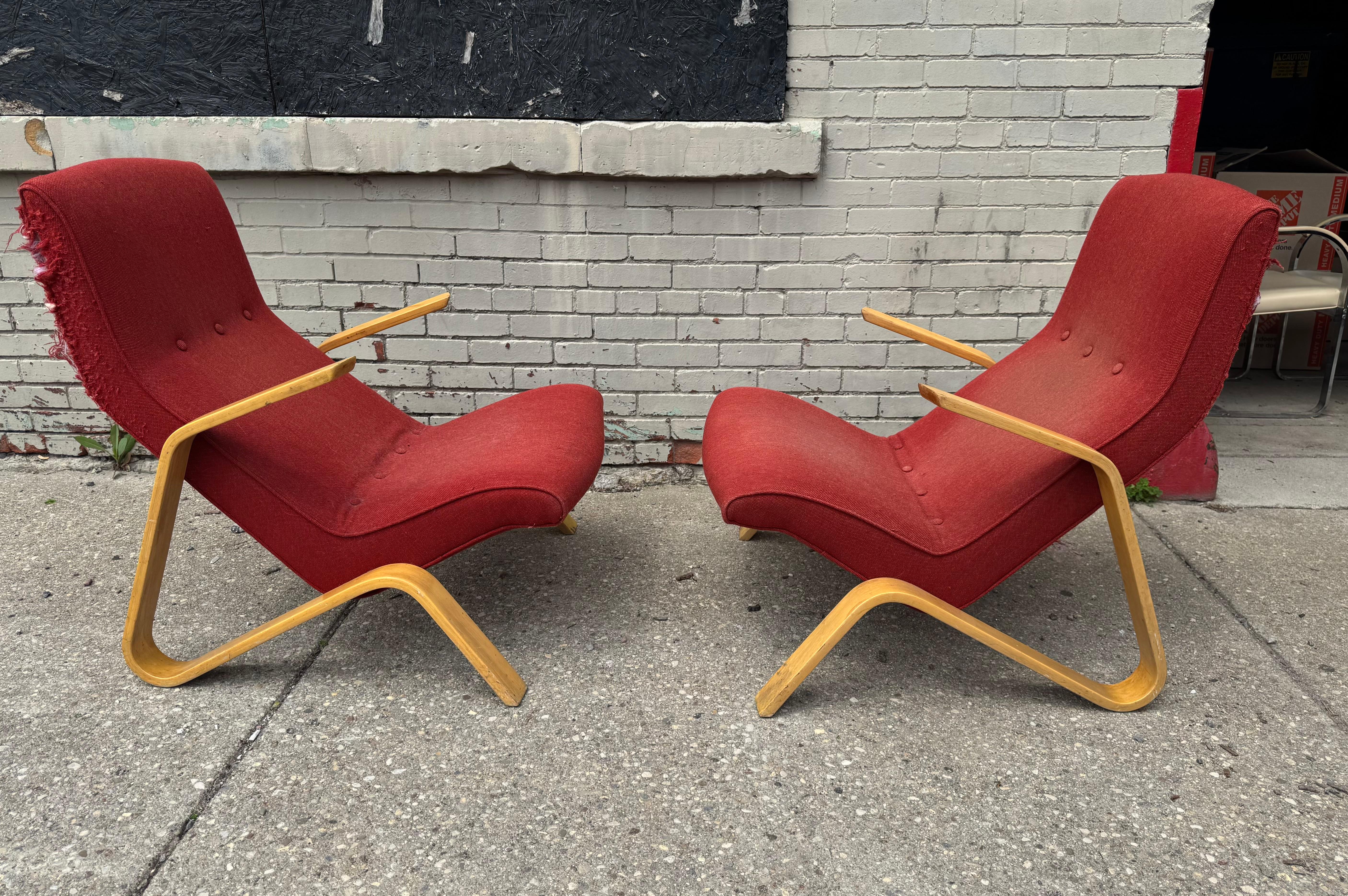 Classic Pair Modernist Grasshopper Lounge Chairs designed by Eero Saarinen for Knoll.. Birch plywood frames in nice original condition,, wonderful color , finish and patina,, the chairs were reupholstered (at some point) , unfortunately cat got to