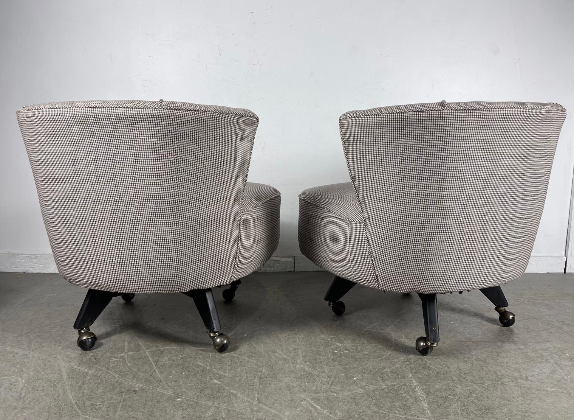 American Classic Pair Mid-Century Modern Swivel Chairs on castors, , attrib to Selig For Sale