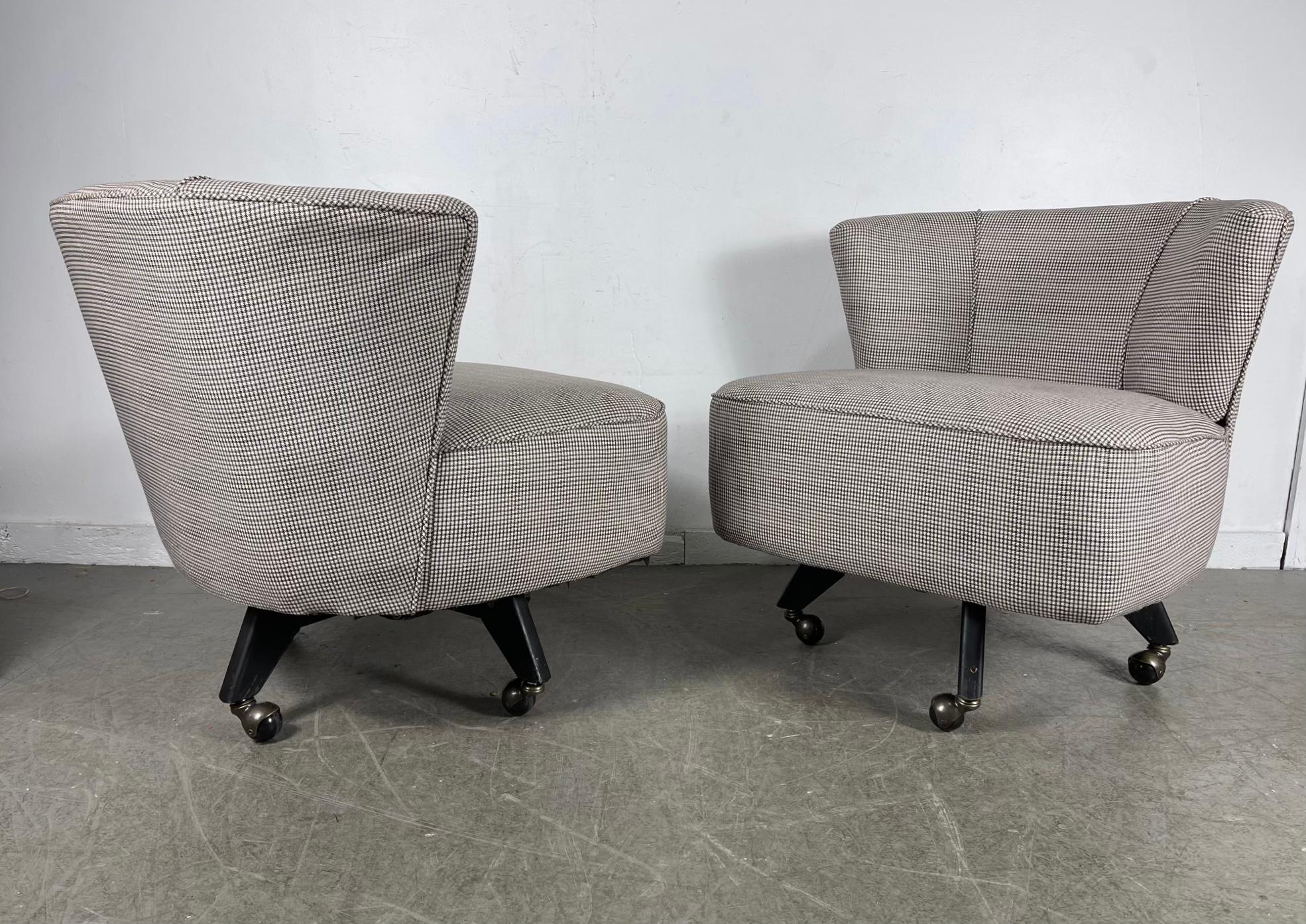 Classic Pair Mid-Century Modern Swivel Chairs on castors, , attrib to Selig In Good Condition For Sale In Buffalo, NY