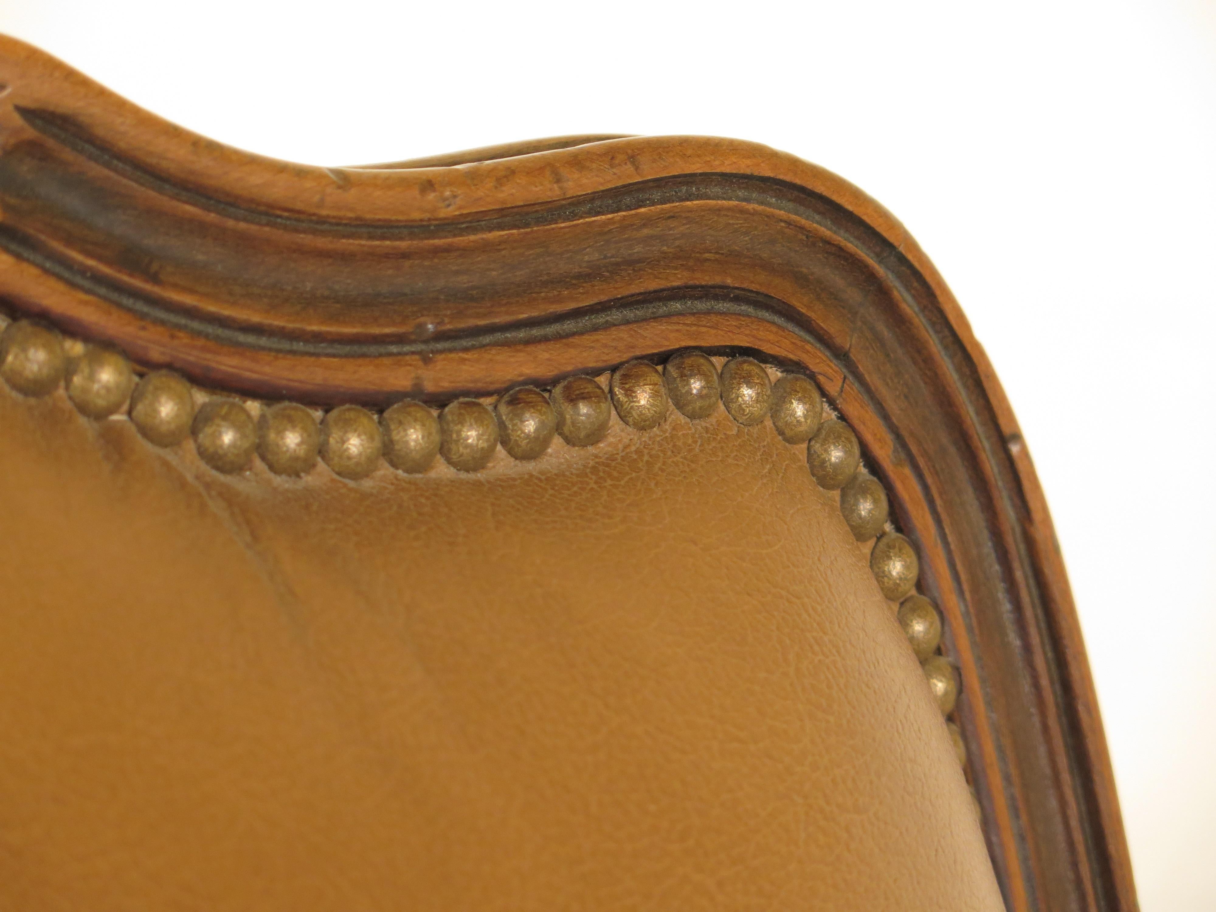 Mid-20th Century Classic Pair of French Louis XV Style Leather Bergères with Ottomans For Sale