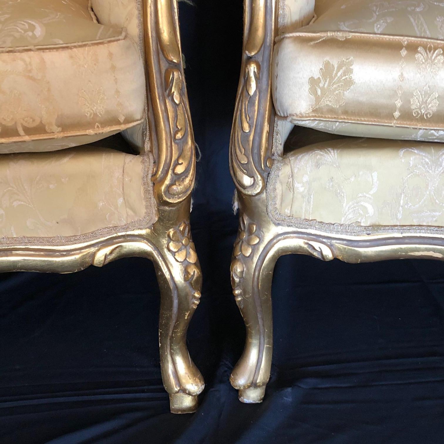 Elegant pair of Louis XV style armchairs having a serpentine carved crestrail over upholstered backs, beautiful carved apron and cabriole legs. Purchased from an estate in Naples Florida, but we think they are Italian, circa 1920.
#1622.