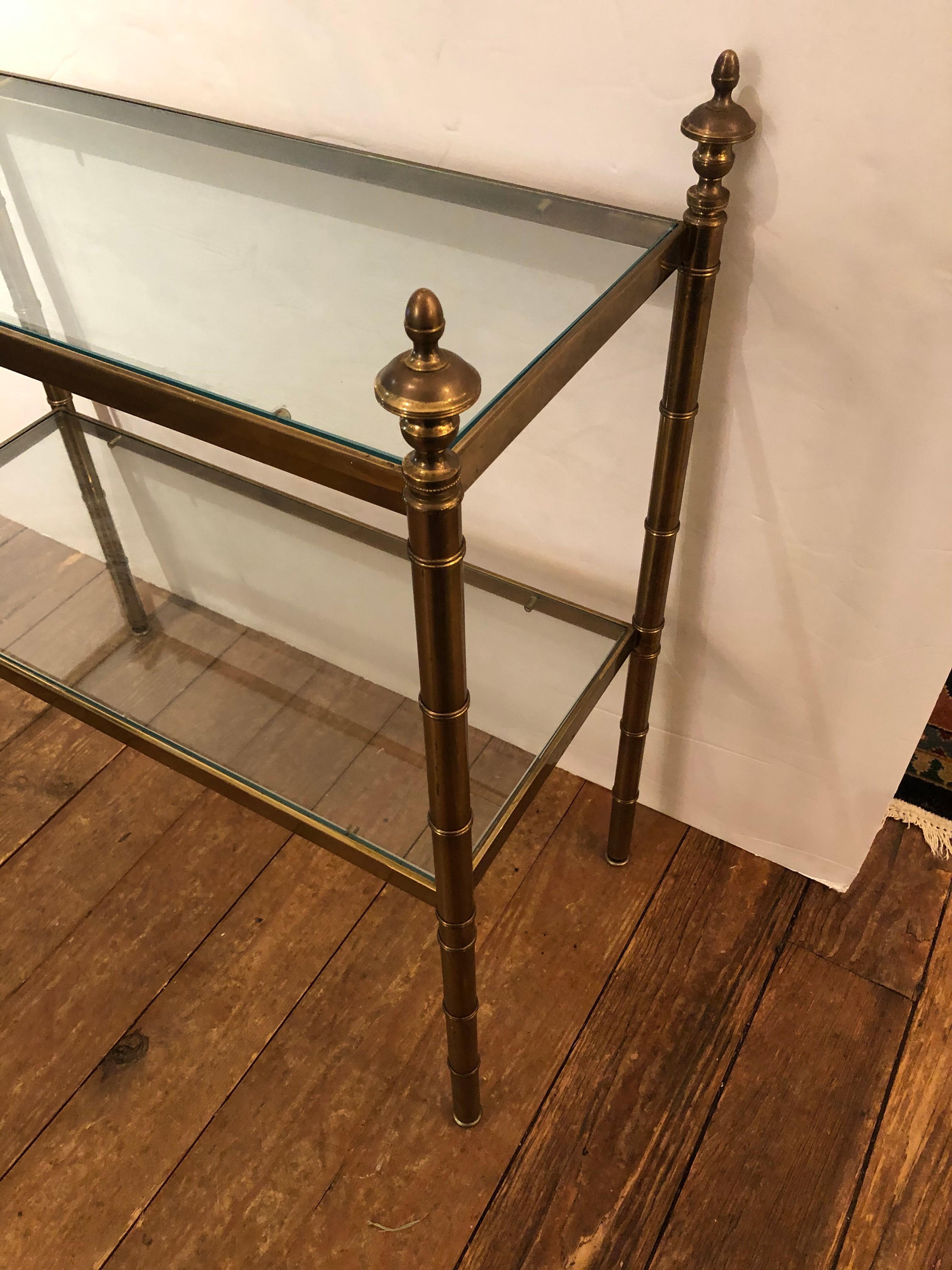 Mid-20th Century Classic Pair of Two Tier Brass & Glass End Tables