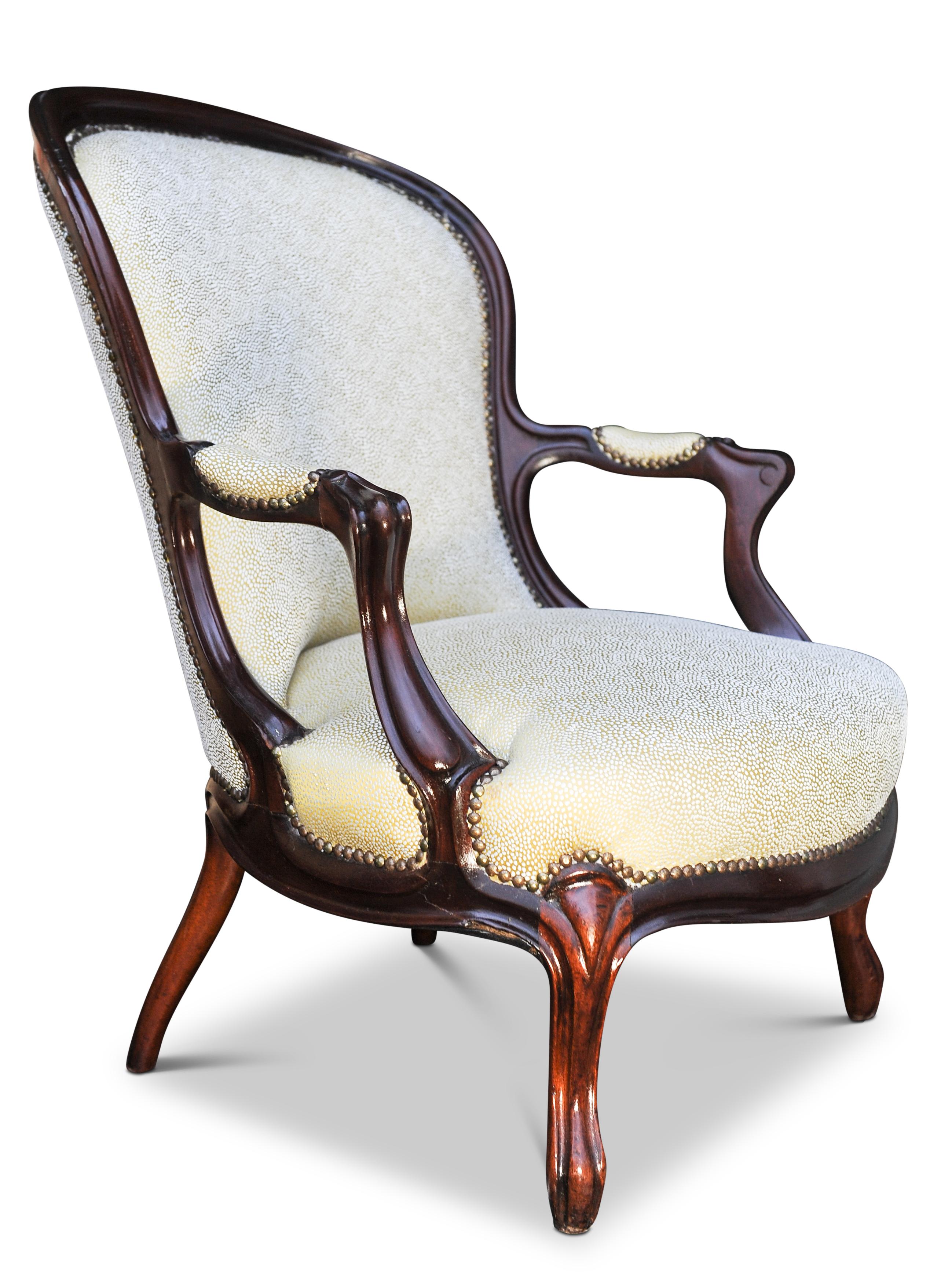 An Elegant Pair of Victorian Shagreen Upholstered Framed Spoon Back Open Armchairs.

Beautiful warm mahogany frames with a luxurious shagreen effect silk upholstery to both armchairs.

Would compliment any Living room, Lounge Parlour Setting

Extra