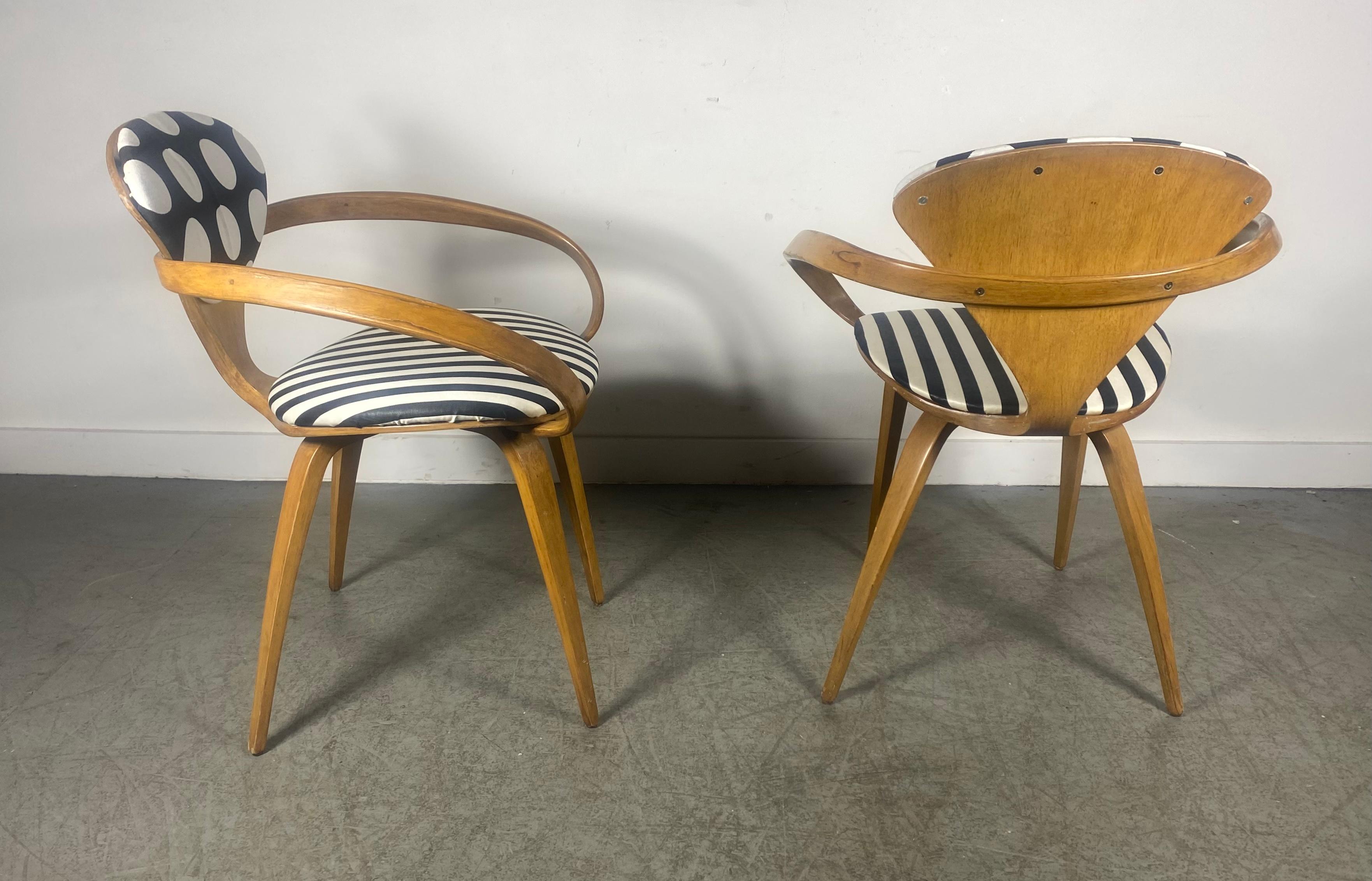 Classic Pair Of Vintage Norman Cherner for Plycraft Pretzel Armchairs c. 1950's... Great early example,, Seat and back reupholstered in a fun pok a dot and stripped black and white fabric,,can easily be upholstered to your liking.. Wonderful warm