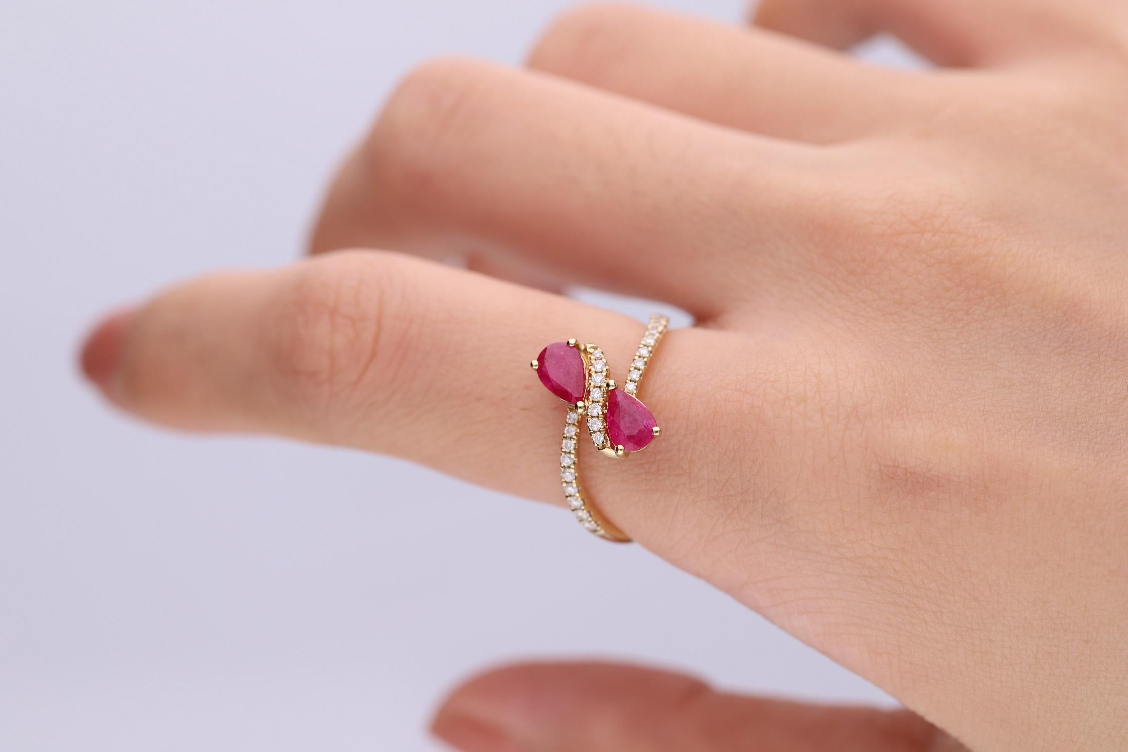 Stunning, timeless and classy eternity Unique Ring. Decorate yourself in luxury with this Gin & Grace Ring. The 10K Yellow Gold jewelry boasts with Pear-cut 2 pcs 0.88 carat Ruby and Natural Round-cut white Diamond (25 Pcs) 0.17 Carat accent stones