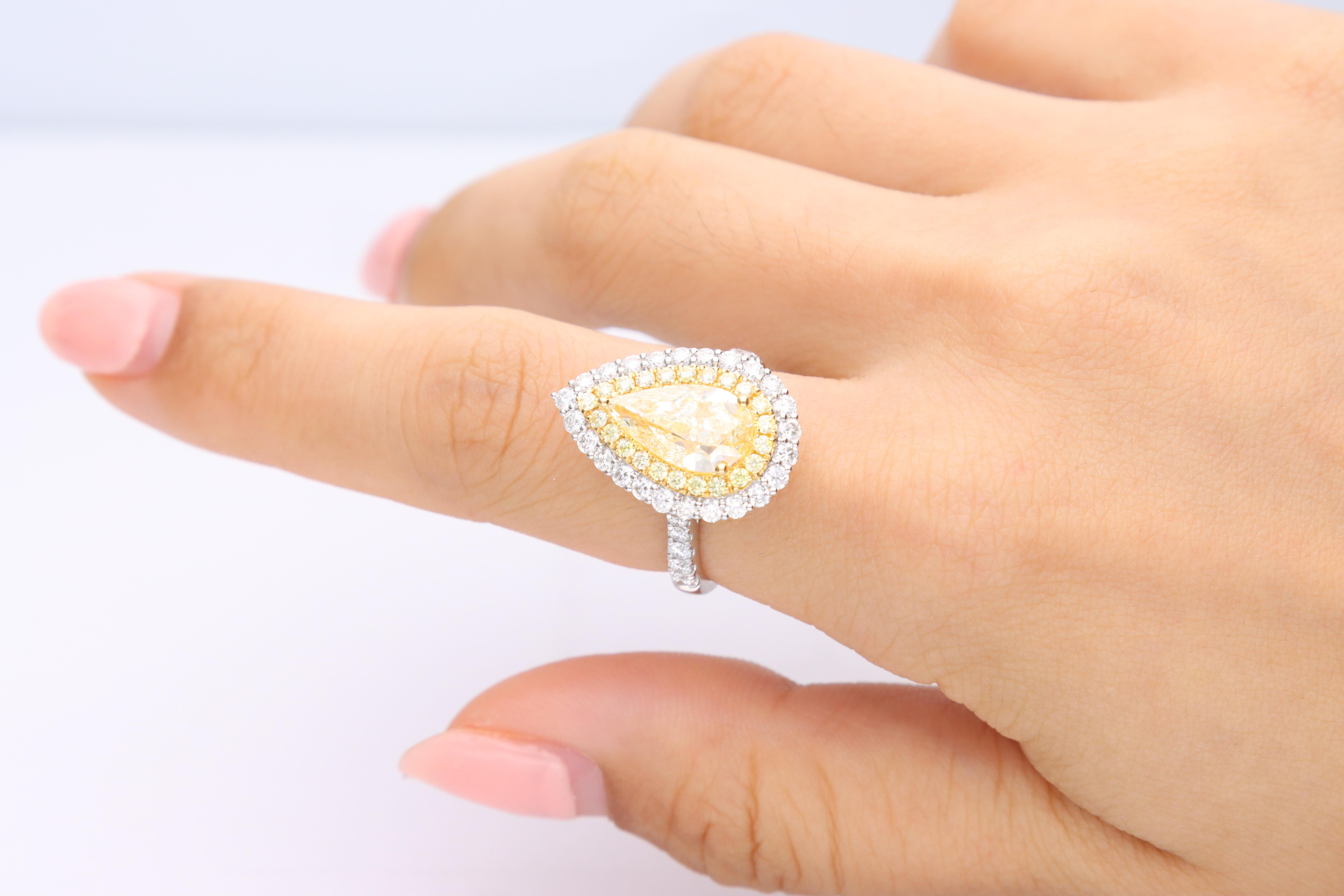 Stunning, timeless and classy eternity Unique Ring. Decorate yourself in luxury with this Gin & Grace Ring. The 18K Two Tone Gold jewelry boasts with Pear-cut 1 pcs  3.01 carat, Round-cut 22 pcs 0.31 carat Yellow Diamond and Natural Round-cut white