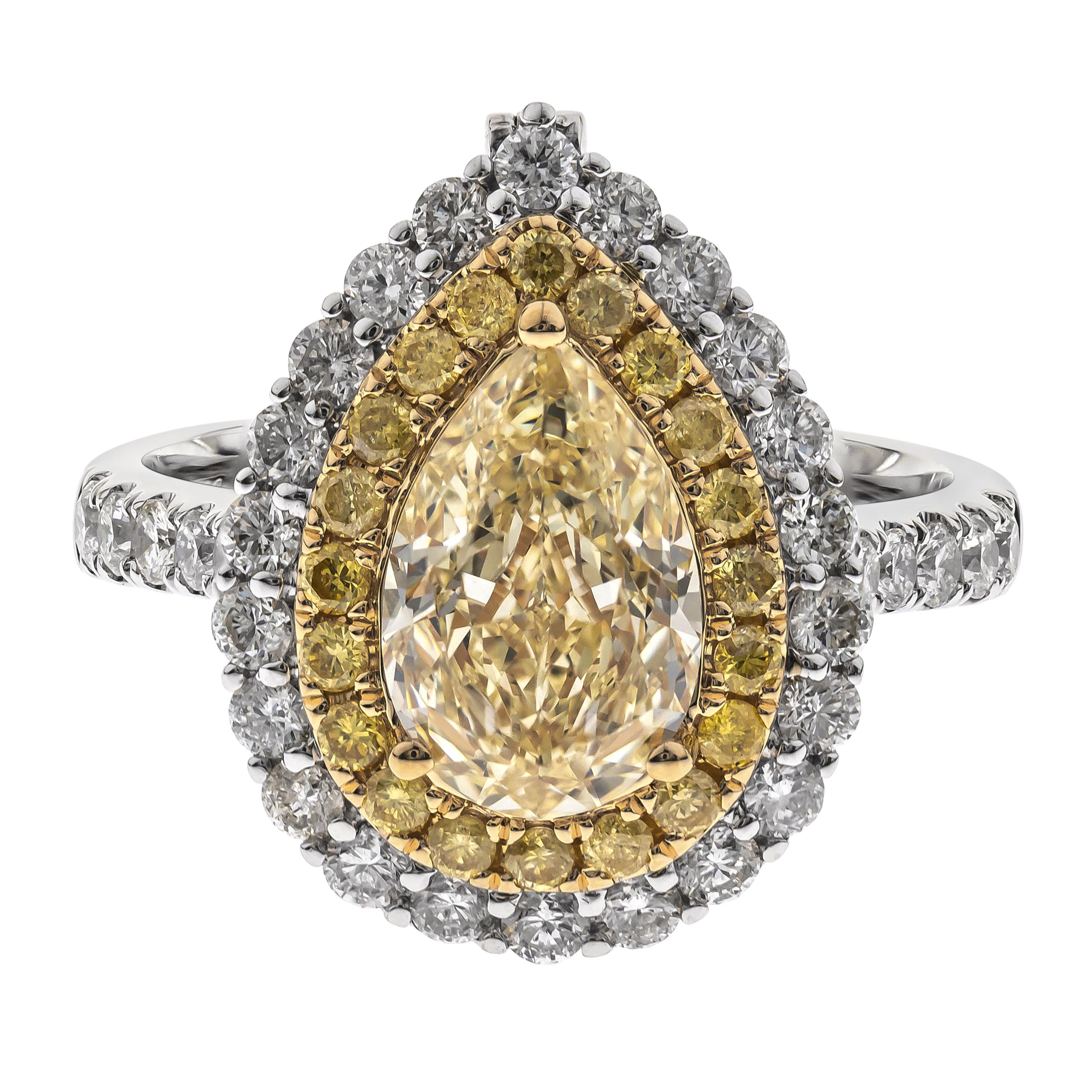 Bague classique en or TT 18 carats diamant jaune taille poire et diamant blanc taille ronde