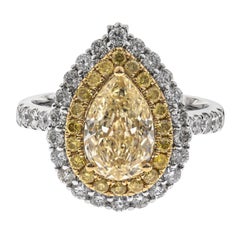 Klassischer gelber Diamant im Birnenschliff und weißer Diamant im Rundschliff 18k TT Gold Ring