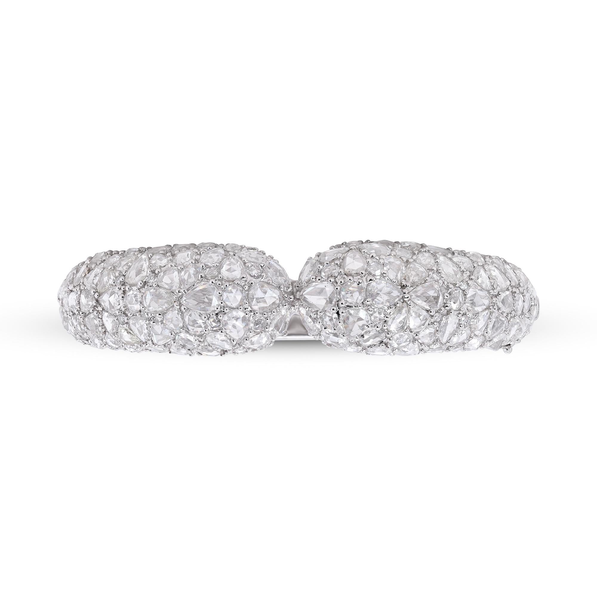 Stunning, timeless and classy eternity Unique Bangle. Decorate yourself in luxury with this Gin & Grace Bangle. The 18K White Gold jewelry boasts with Pear-cut (18 pcs) 2.16 carat , Rose-cut (43 Pcs) 2.52 Carat, WD (57 Pcs) 6.76 carat, Round-Cut (22