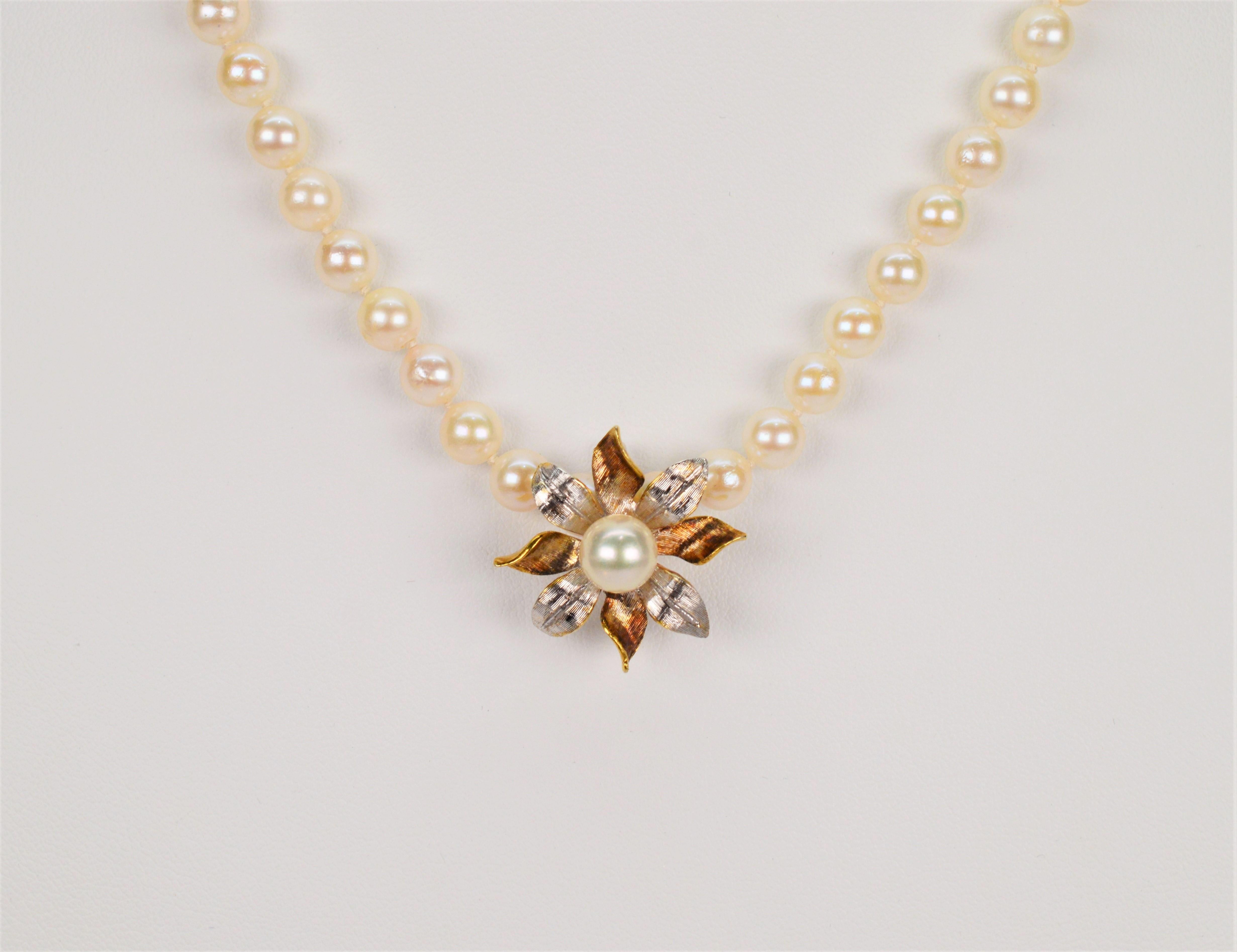 Round Cut Classic Pearl Strand with 14 Karat Gold Vintage Floral Burst Enhancer For Sale