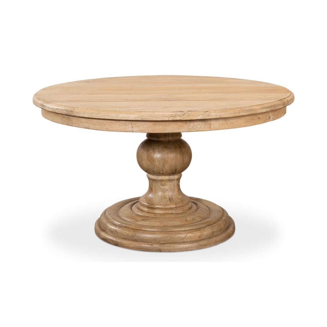 Crafted from mango wood with a Sienna finish, combines the rustic charm of French Country style with the functionality of modern design. With a diameter of 54 inches and a height of 30 inches, it’s comfortably sized for intimate gatherings.

The