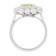Classic Peridot and Diamond Halo Ring, circa 1980s