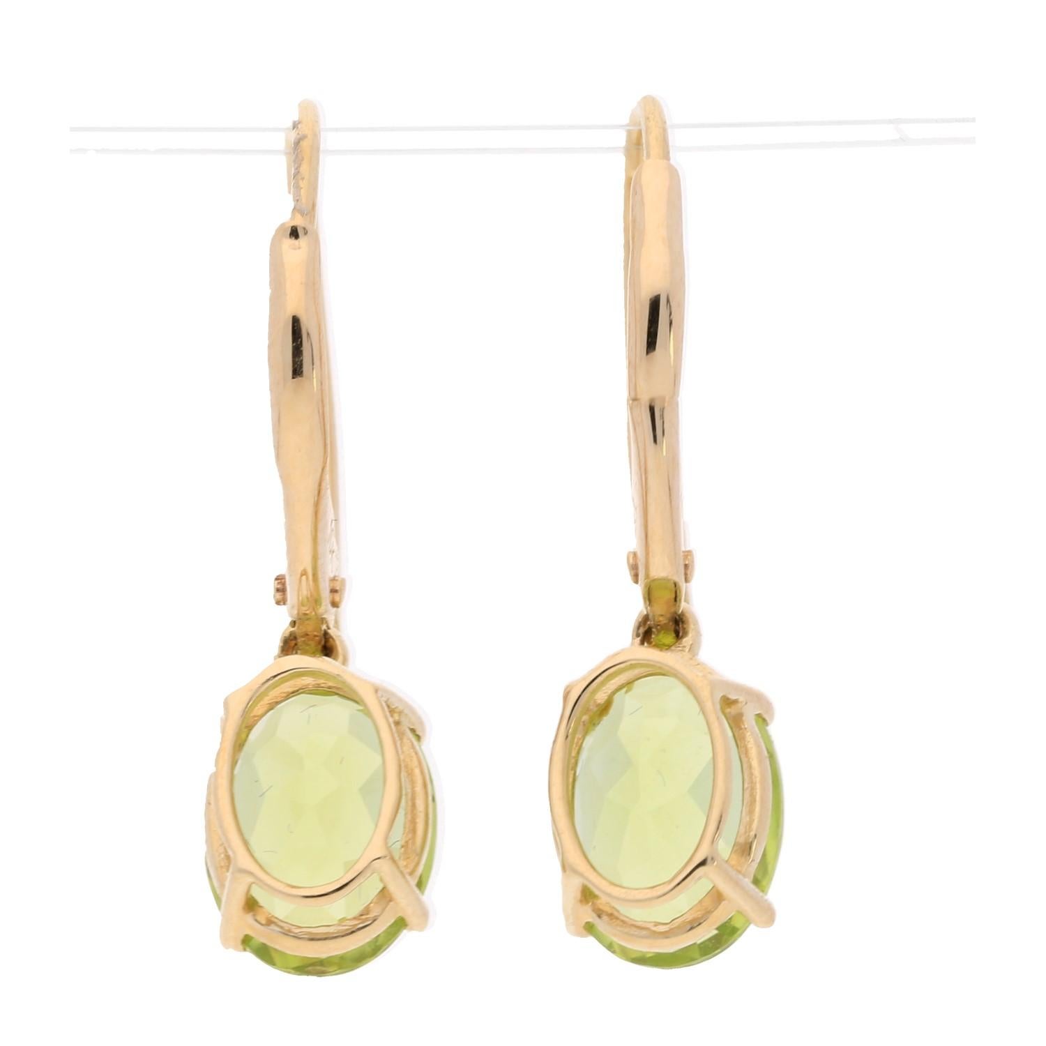 Classic Peridot Oval Cut With Diamond Accents 10K Yellow Gold Earring In New Condition For Sale In New York, NY