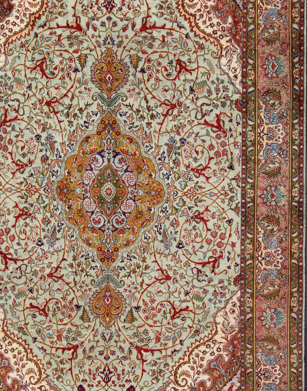 Tabriz vintage rug from Persia with a classic medallion Floral design in beautiful celadon green background, salmon border with accent colors of red, yellow or orange and ivory, dark green, turquoise blue, navy blue, tan and taupe, rug H-609-26,