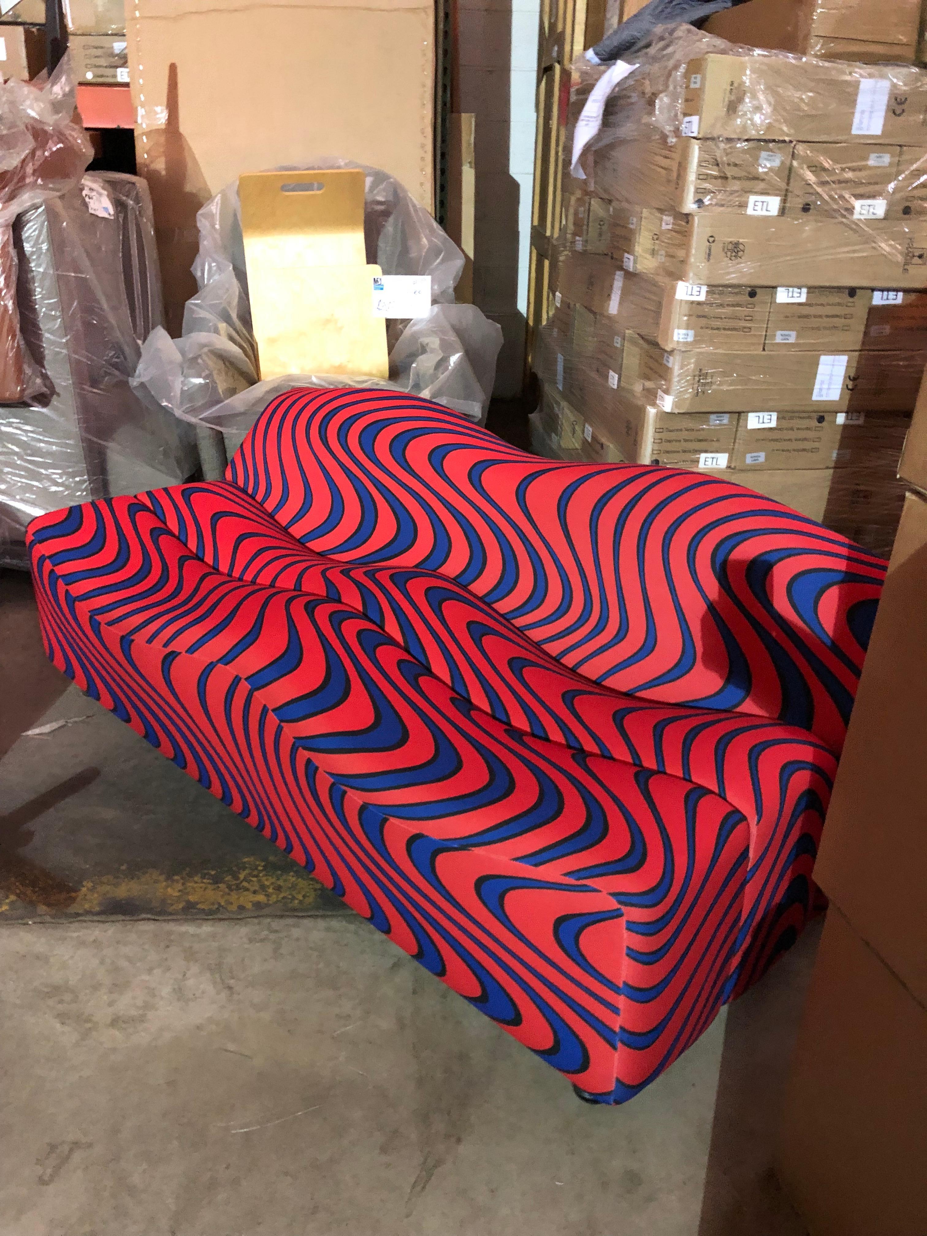 Upholstered in momentum blue flame by Jack Lenor Larsen
The ABCD two-seat is a comfortable modern sofa. The ABCD modern seating series was designed by Pierre Paulin for Artifort in the Netherlands in 1966. It is one of the classics in the history
