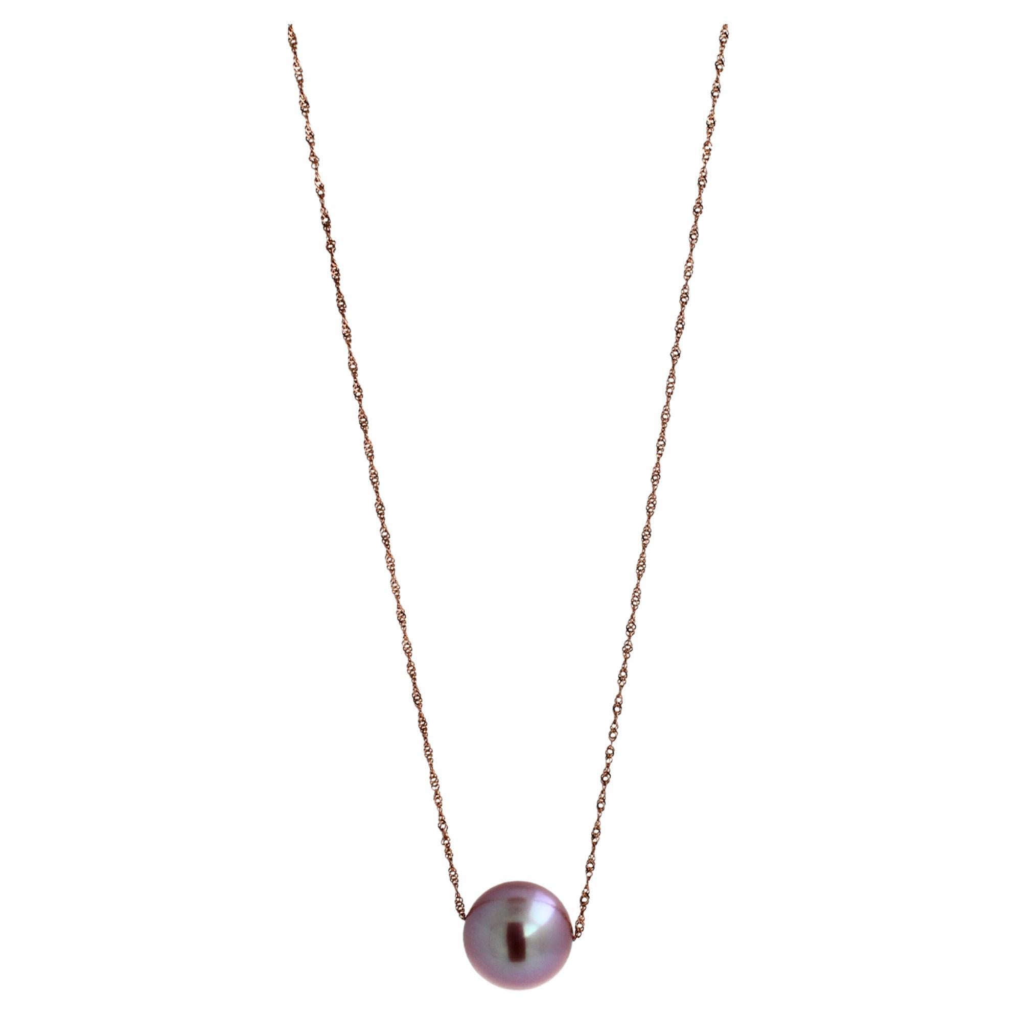 Pink Pearl 
14 Karat Rose Gold
Adjustable Length High-Finish Chain
High Quality Pearl with Beautiful Shine, Luster, Size & Brilliance
Classic, Minimalistic Design 