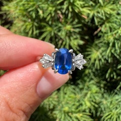Classic Platinum 1.4ctw Oval Sapphire w/ Baguette & Round Diamond Shoulders Ring