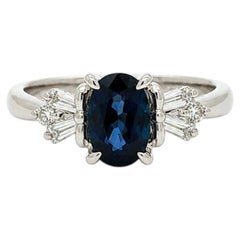Classic Platinum 1.4ctw Oval Sapphire w/ Baguette & Round Diamond Shoulders Ring