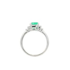 Classic Platinum 1.5ctw Emerald & Baguette Diamond Step Style Sides Ring