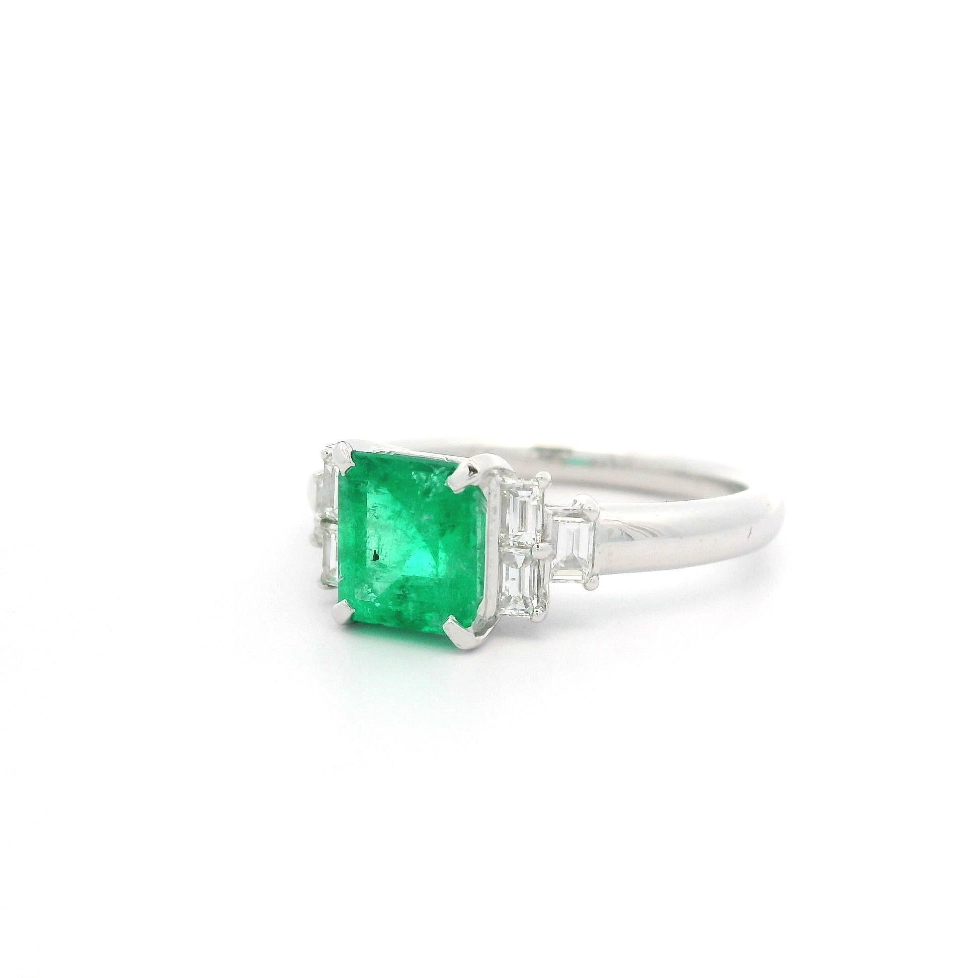 Classic Platinum 1.5ctw Emerald & Baguette Diamond Step Style Sides Ring In Excellent Condition For Sale In Montclair, NJ