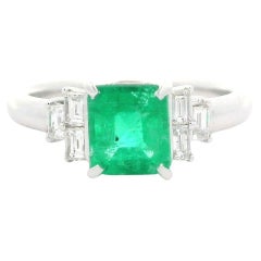 Classic Platinum 1.5ctw Emerald & Baguette Diamond Step Style Sides Ring