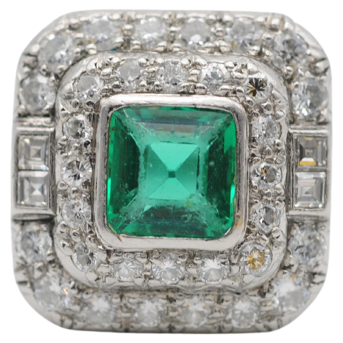 Classic Platinum Emerald Ring with Diamonds