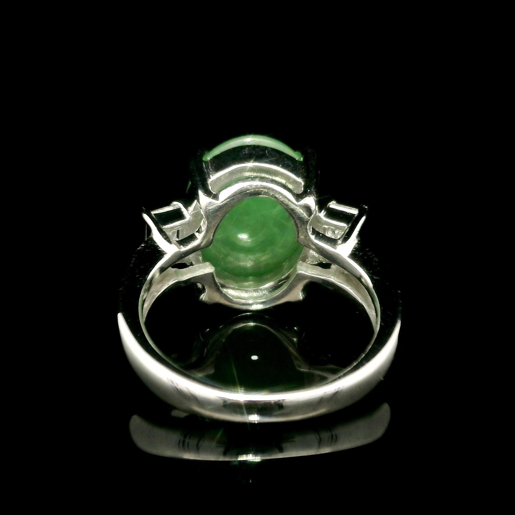 --Stone(s):--
(1) Natural Genuine Jade - 100% Natural - Oval Cabochon Cut - Prong Set - Green Color - A - 5.90ct (exact - stamped)
** See Certification Details Below for Complete Info **
(2) Natural Genuine Diamonds - Emerald Cut - Prong Set - Nice