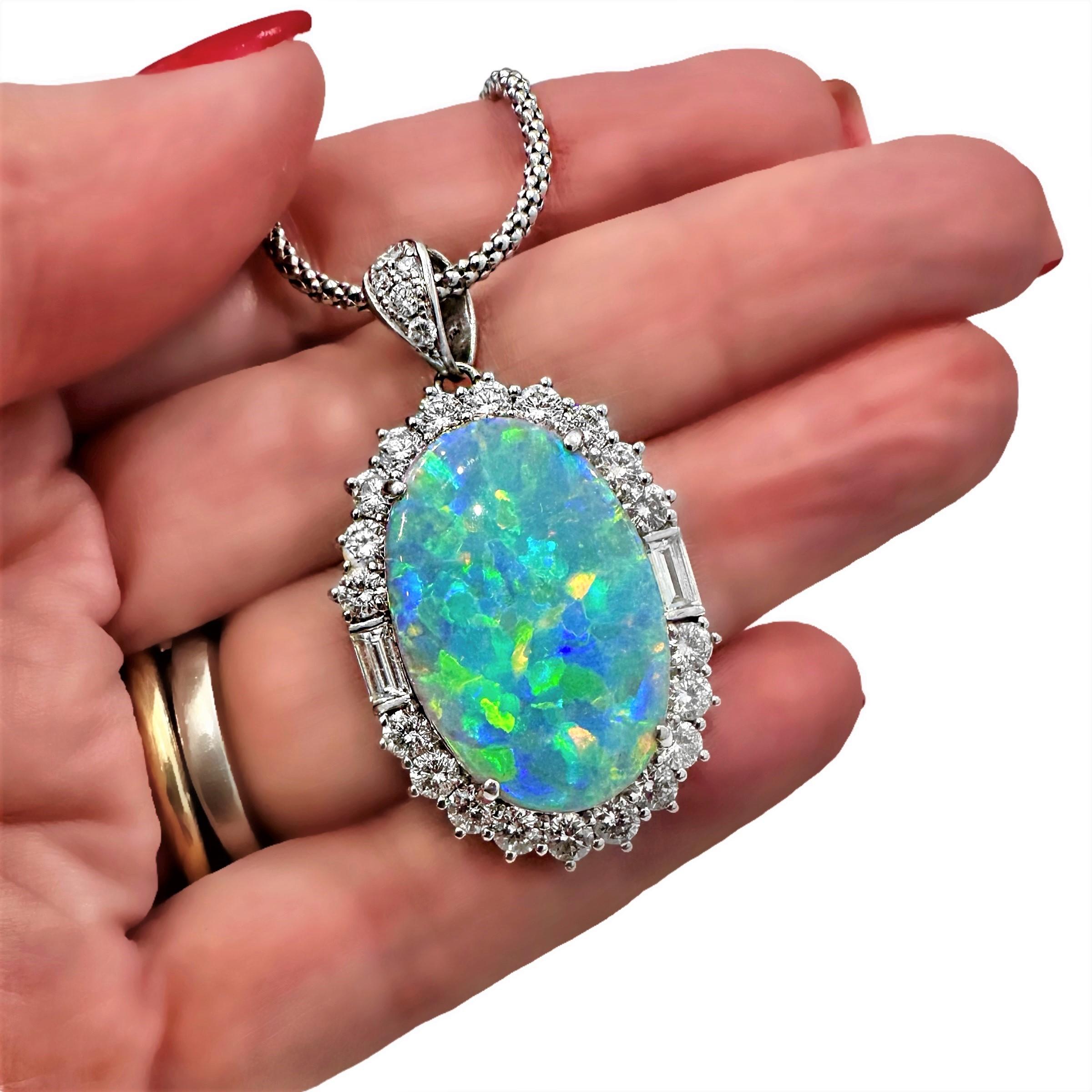Brilliant Cut Classic Platinum Pendant with Opal Center Surrounded by Diamonds For Sale