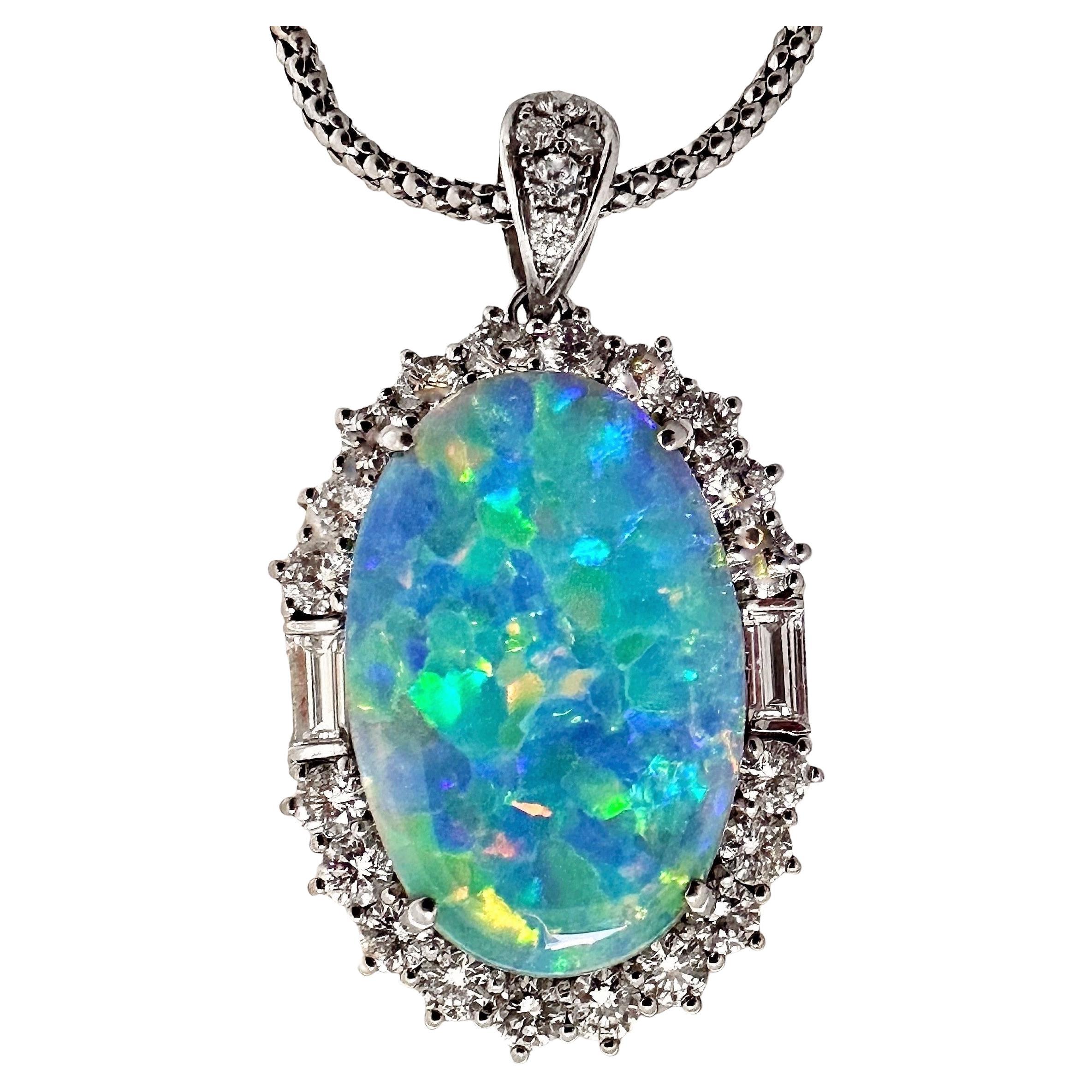 Classic Platinum Pendant with Opal Center Surrounded by Diamonds For Sale
