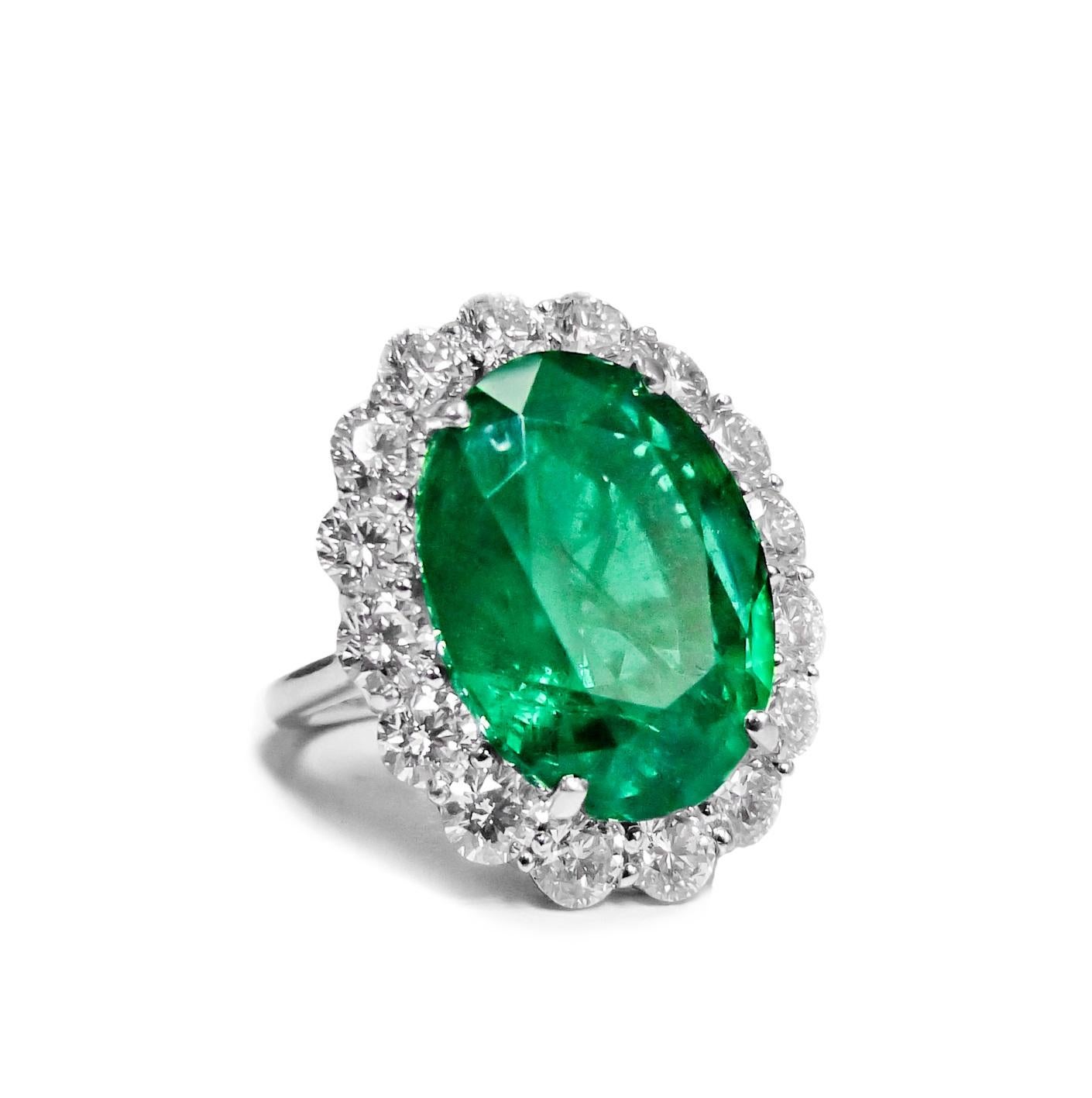 Emerald Cut Classic Platinum Ring with Green Emerald & Round Diamonds For Sale