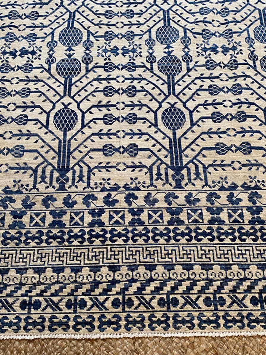 Orgin: Mongolia
Dimensions: 9’4″ x 12′
Age: 1950’s
Design: Khotan
Material: 100% Wool-pile
Color: Dark Blue, Beige, Peach

14008

An epitome of history, character and culture, Antique Khotan rugs add richness to a room. Produced in Khotan, an area