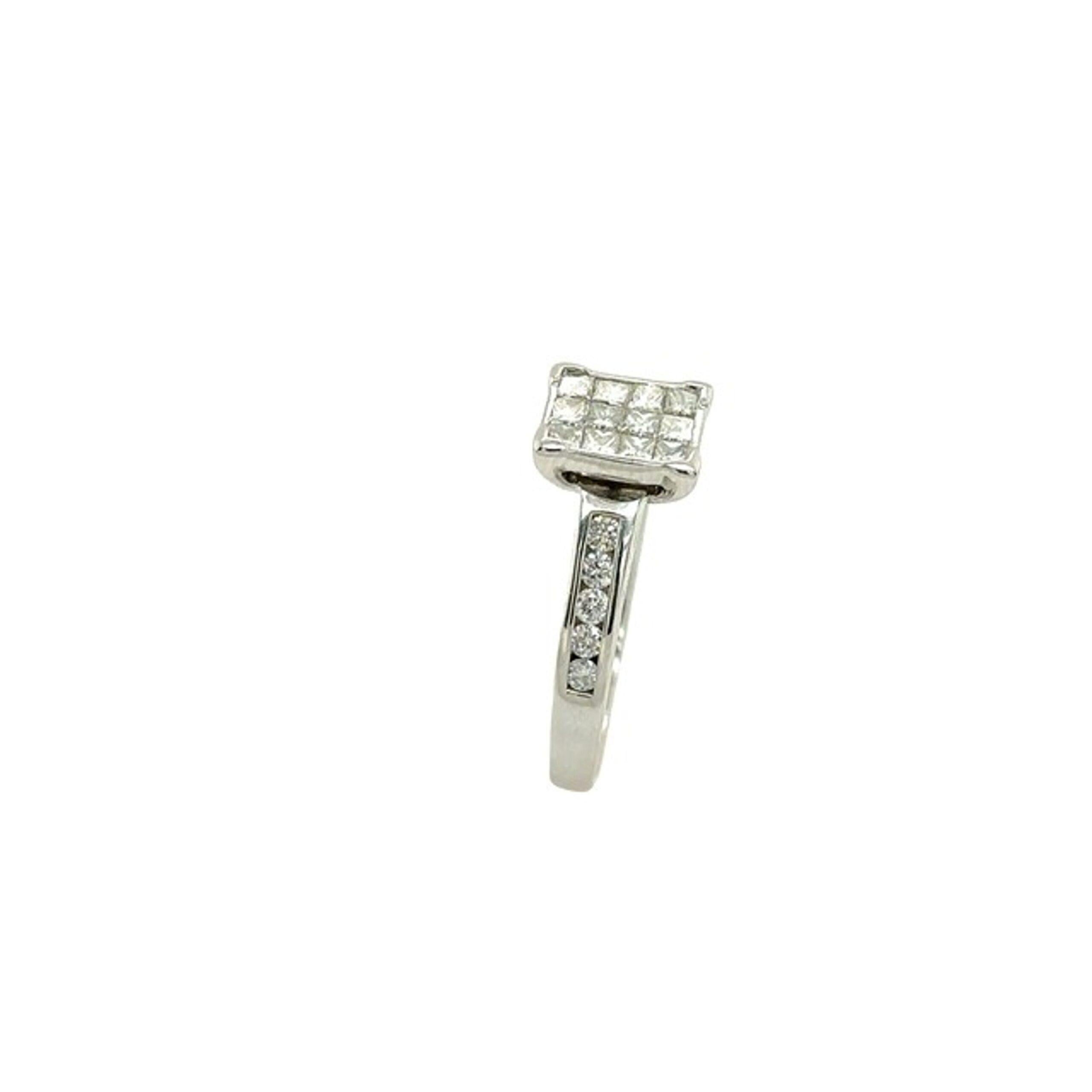 18ct White Gold Classic Princess Cut Diamond Ring, Set With 0.85ct of Diamonds

This is a cluster design of diamonds, it is a white gold ring with a princess cut diamond in the center and ten round diamonds on each shoulder, with a total diamond
