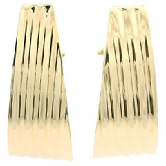 Boucles d
oreilles bouffantes en or jaune 14k cannelé poli à large manchette