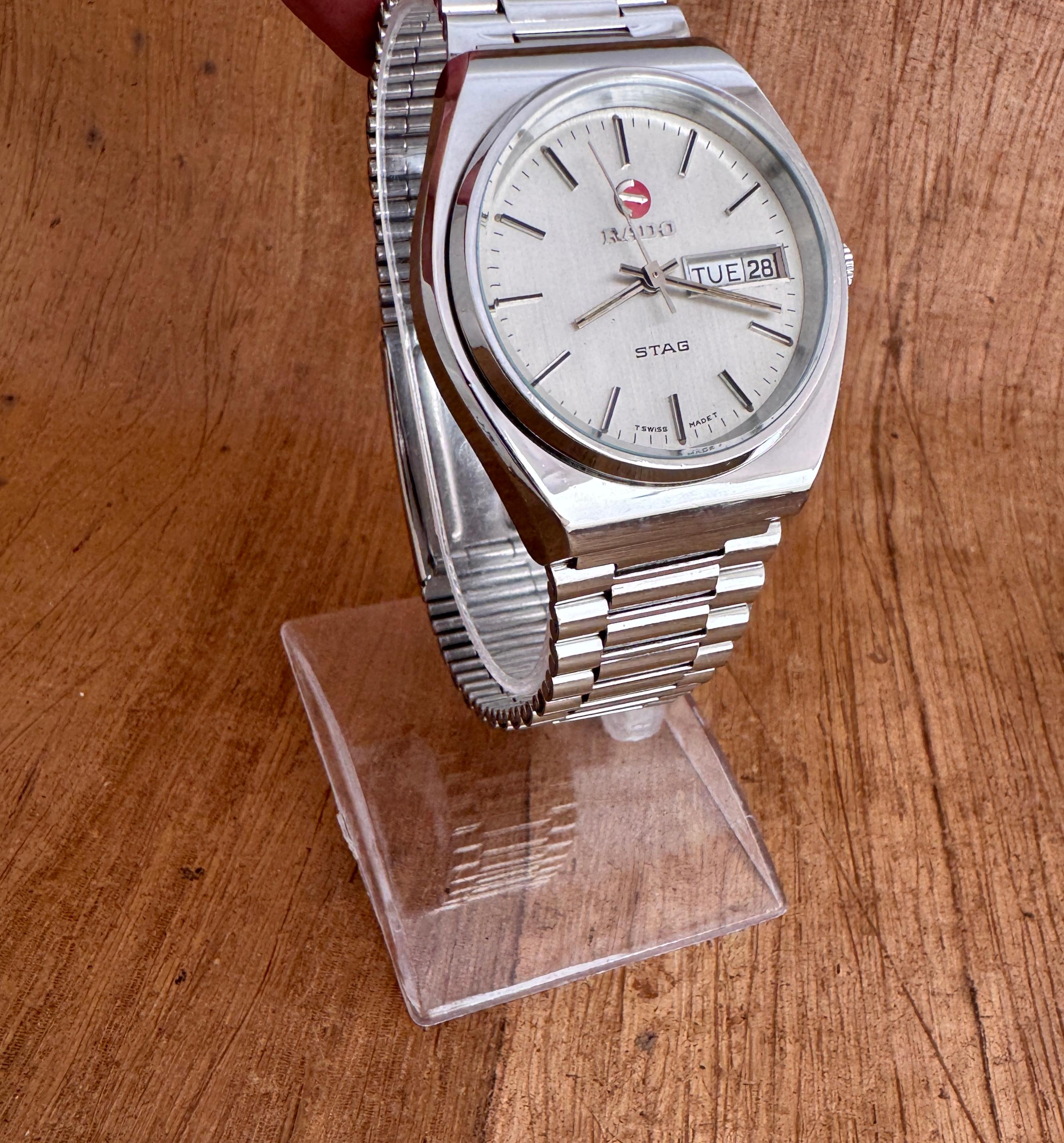 Brand : Rado

Model: Stag

Reference Number: 603.3177.4

Country Of Manufacture: Switzerland

Movement: Automatic

Case Material: Stainless Steel

Measurements :36mm diameter (excluding crown ) x 41 mm

Band Type : Stainless Steel With Marked