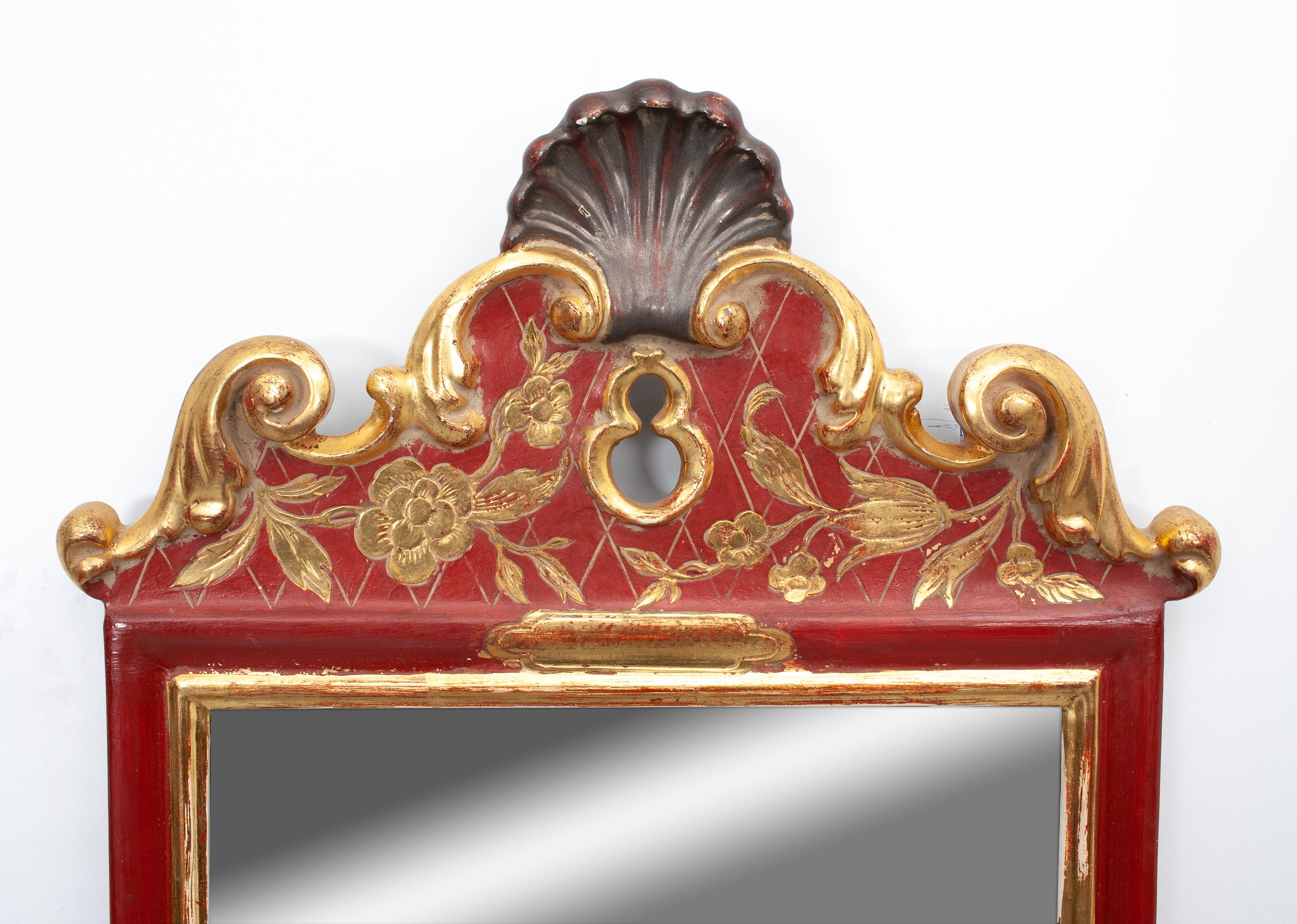 Very nice Classic shaped wall mirror. In a gold and red color. 1940/50
Beautiful and decorative mirror.
  