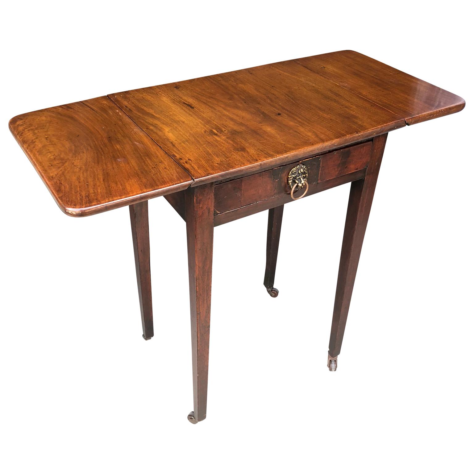 Classic Regency style drop-leaf table with lion-head hardware.
Full width including both drop-leaves is 36 inches.

 