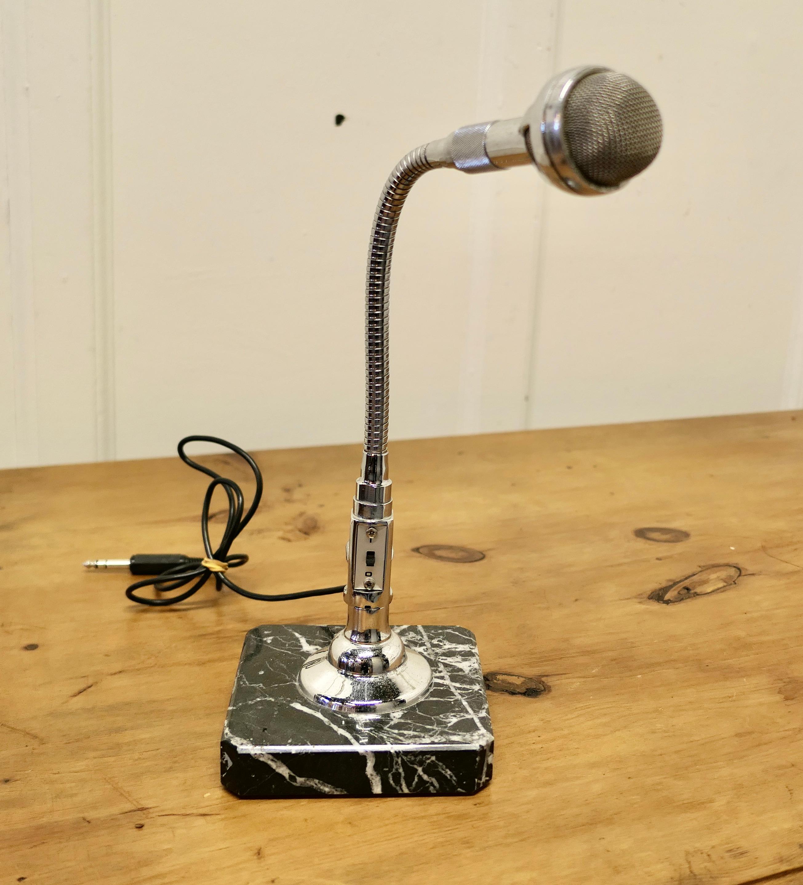 Classic Retro Chrome Mike by Bouyer set on a marble table stand

A Classic of its time, this Bouyer 709 Goose Neck Microphone would be great in a 60s Retro design setting, it is in excellent looking condition it appears to be working but it is